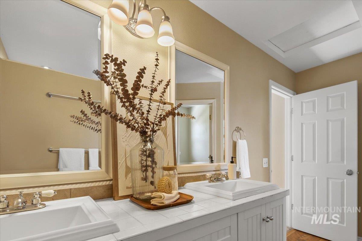 Bathroom featuring double vanity