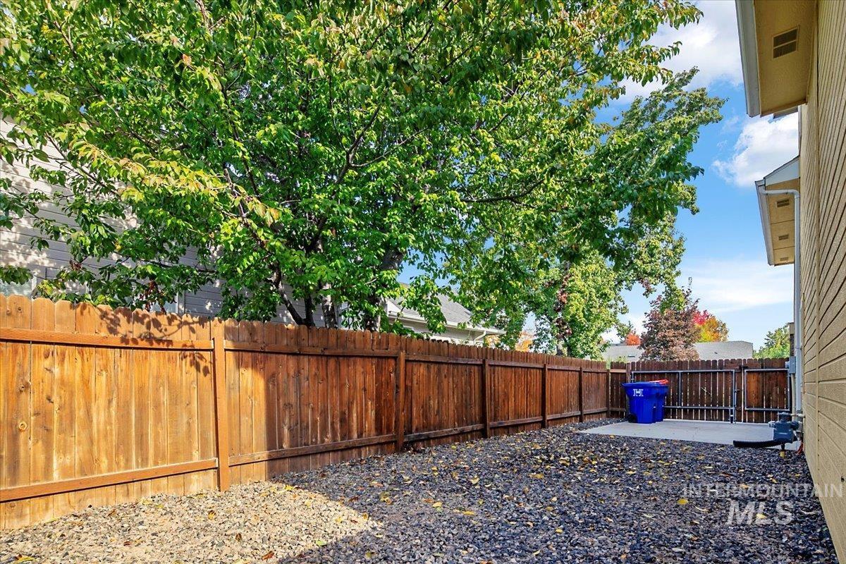 View of fenced backyard