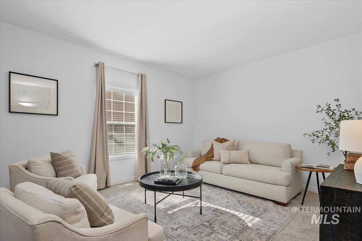 Living area featuring carpet floors