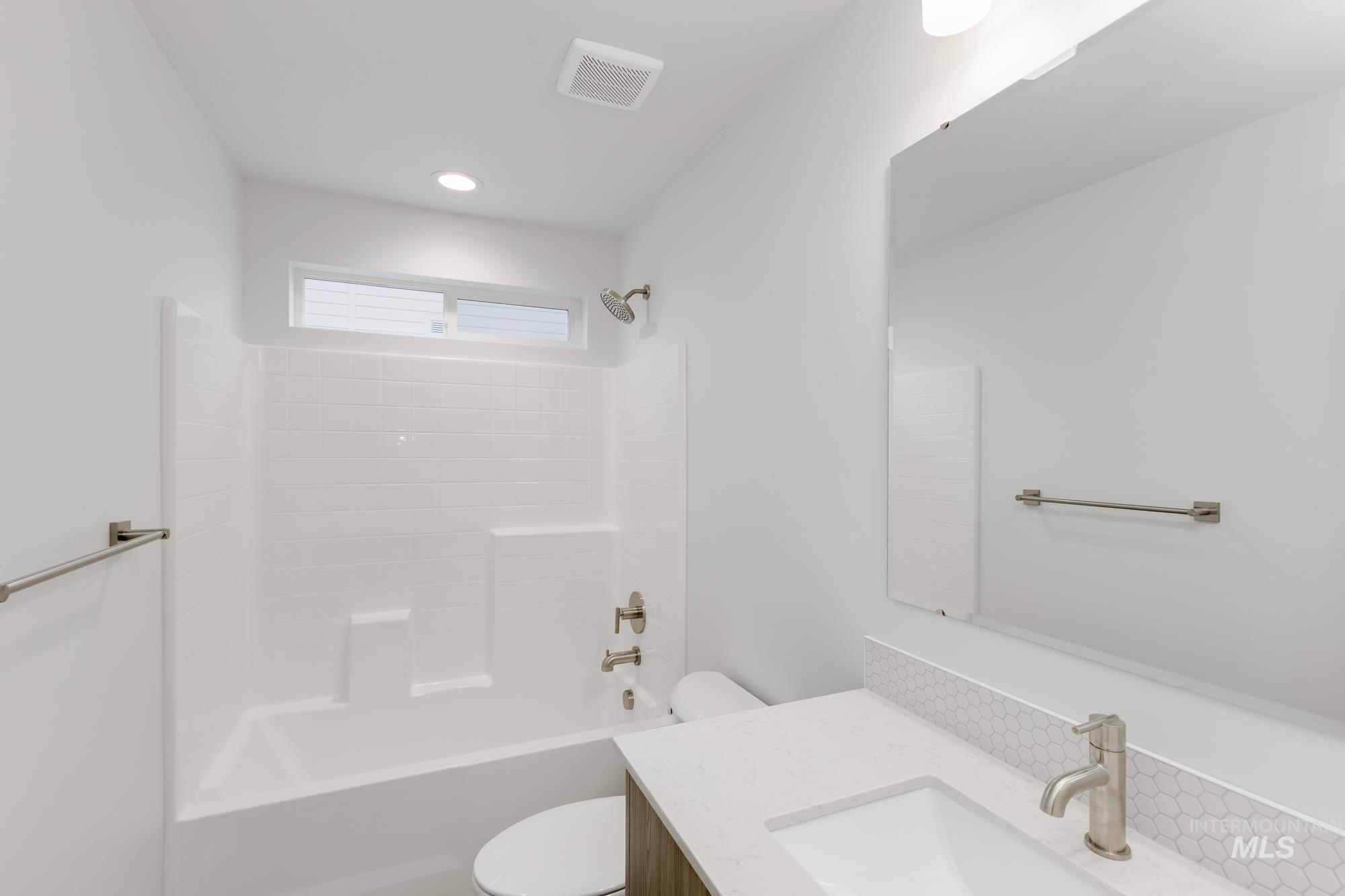 Bathroom with tub / shower combination and vanity
