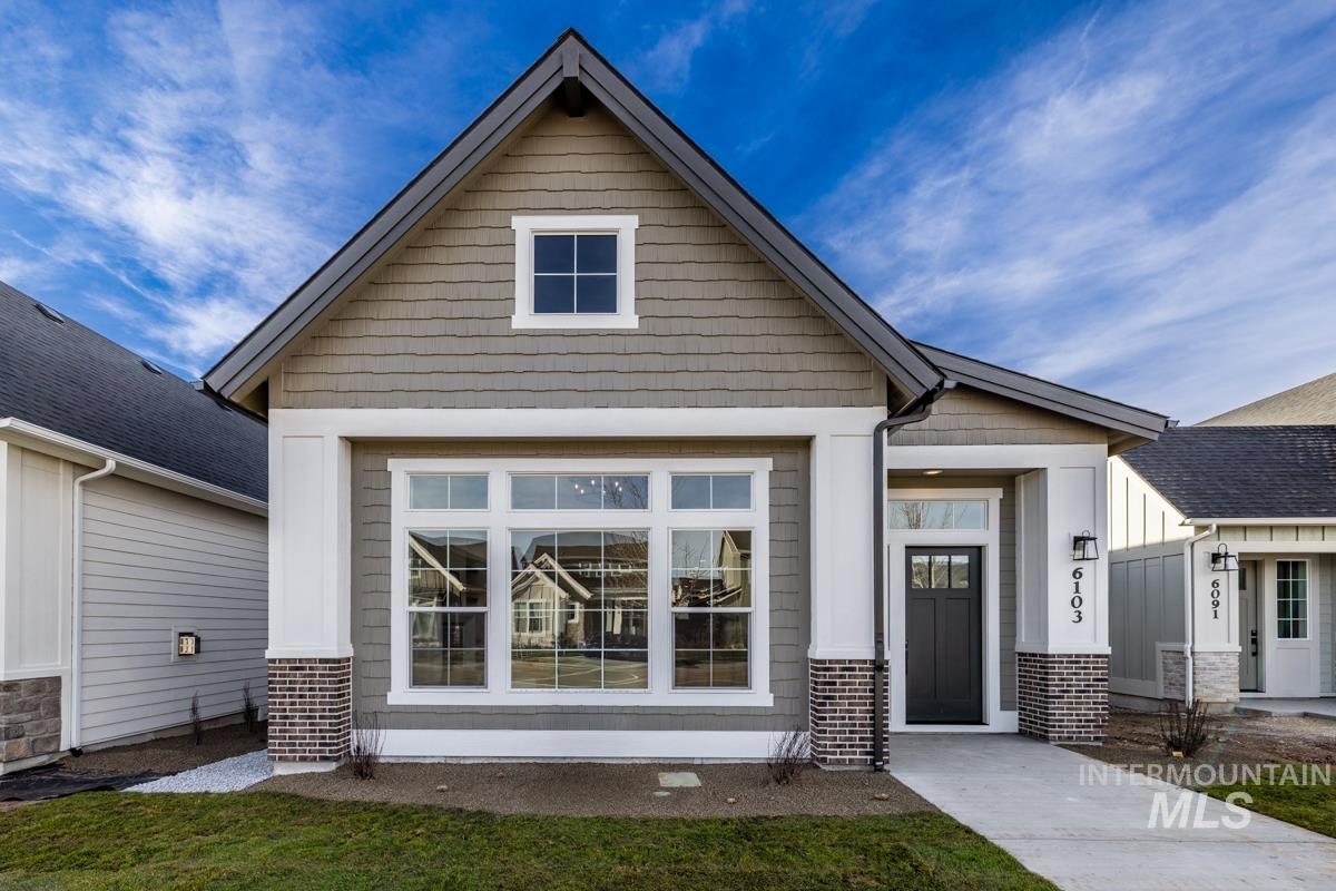 Craftsman-style house featuring board and batten siding