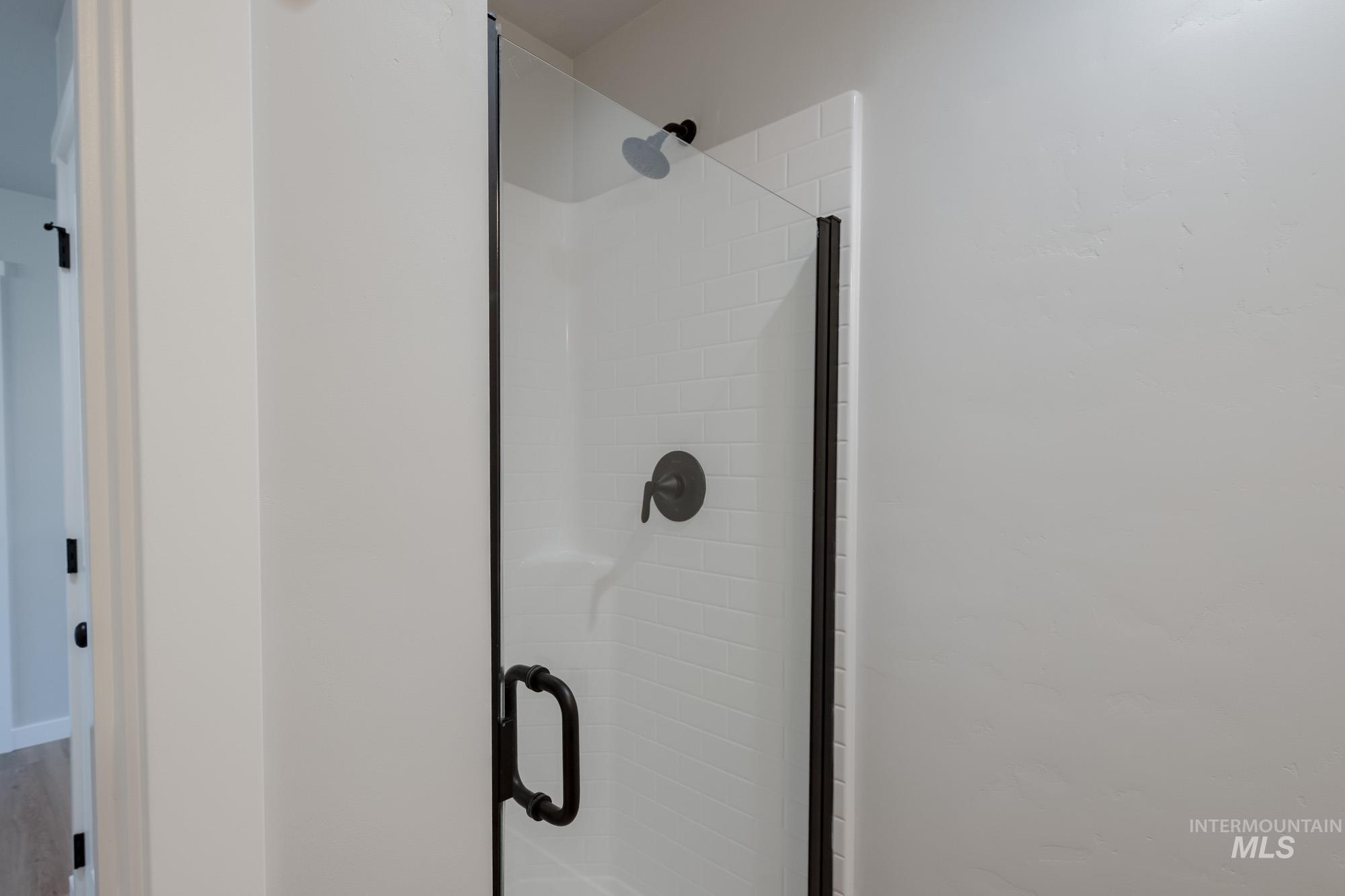 Bathroom view of a shower stall