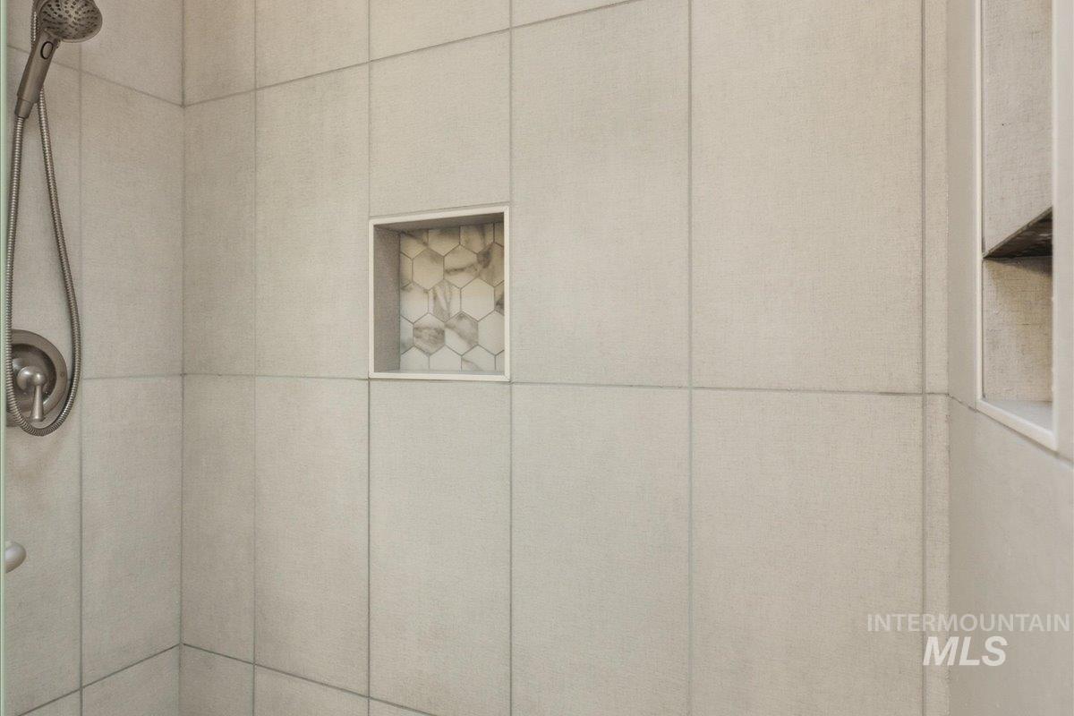 Bathroom view of tiled shower