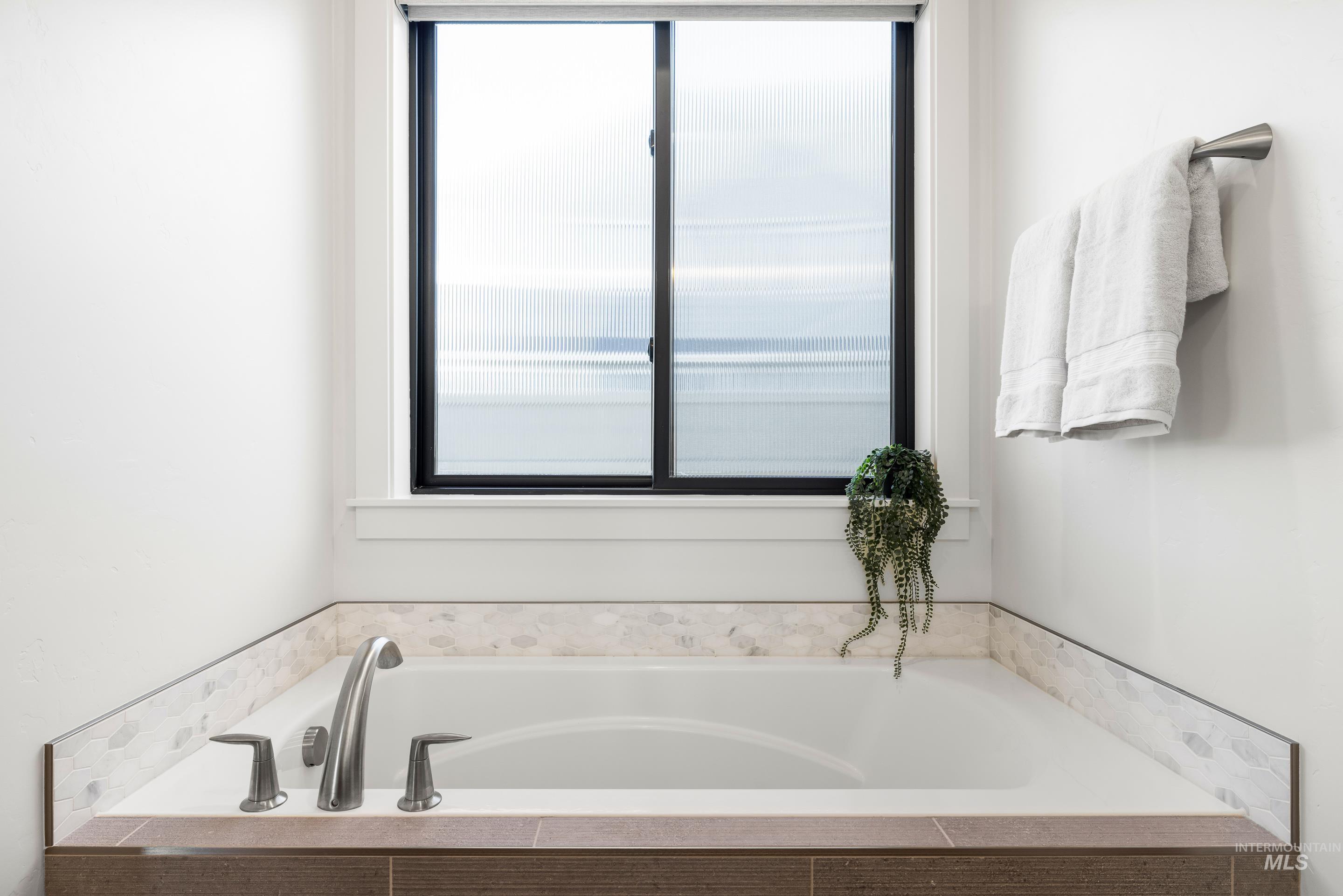 Bathroom featuring a bath