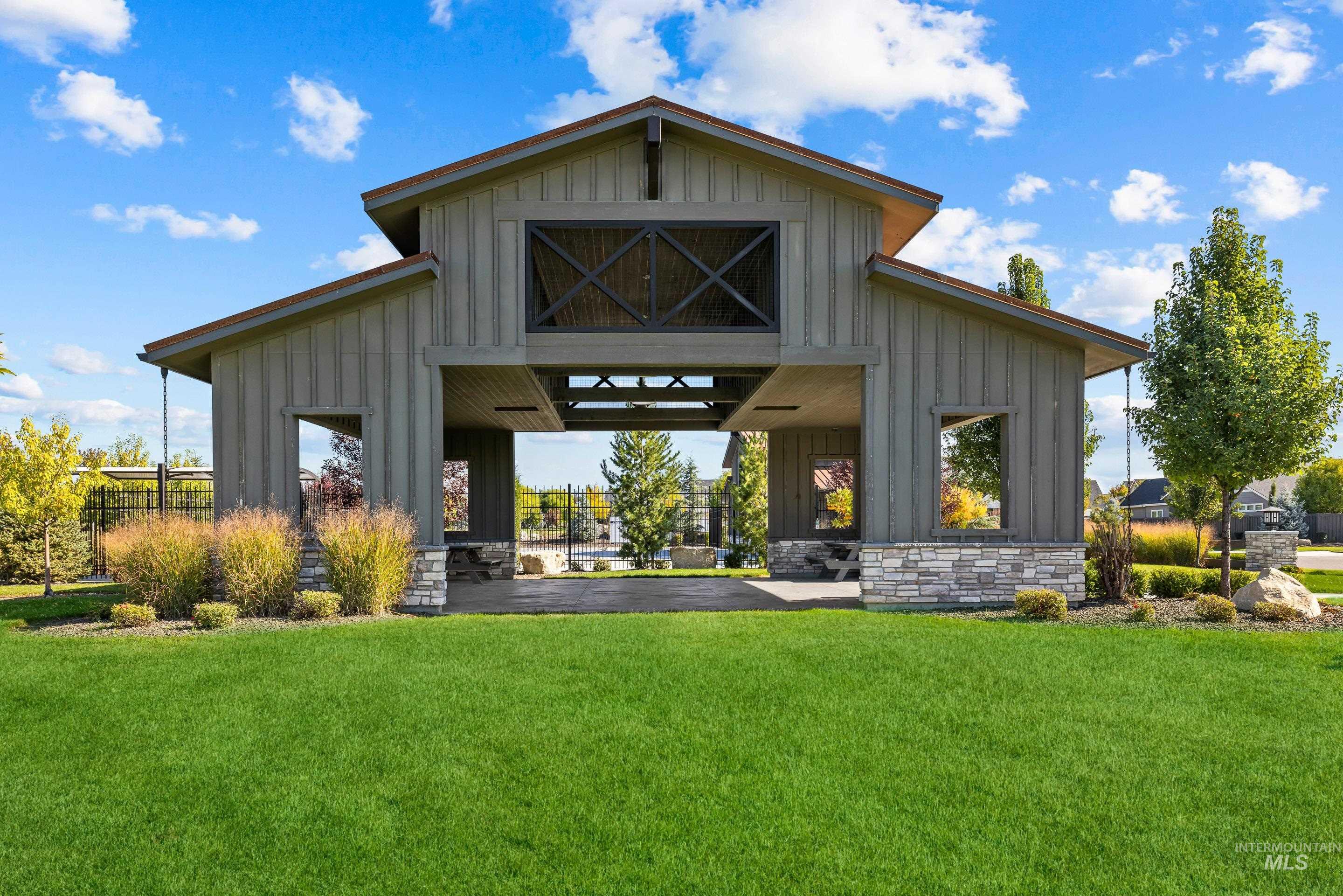 View of community featuring a lawn