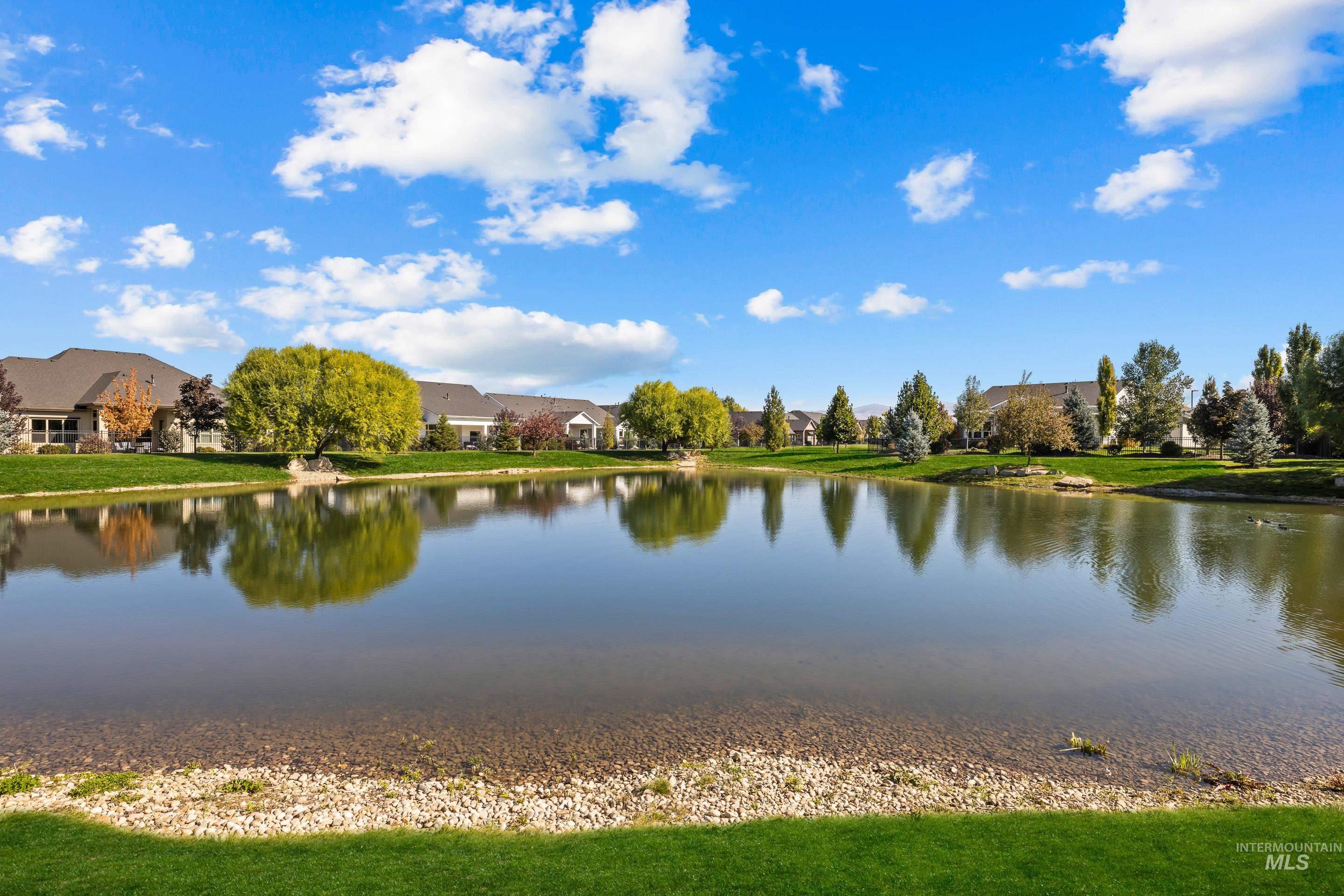 Water view with nearby suburban area
