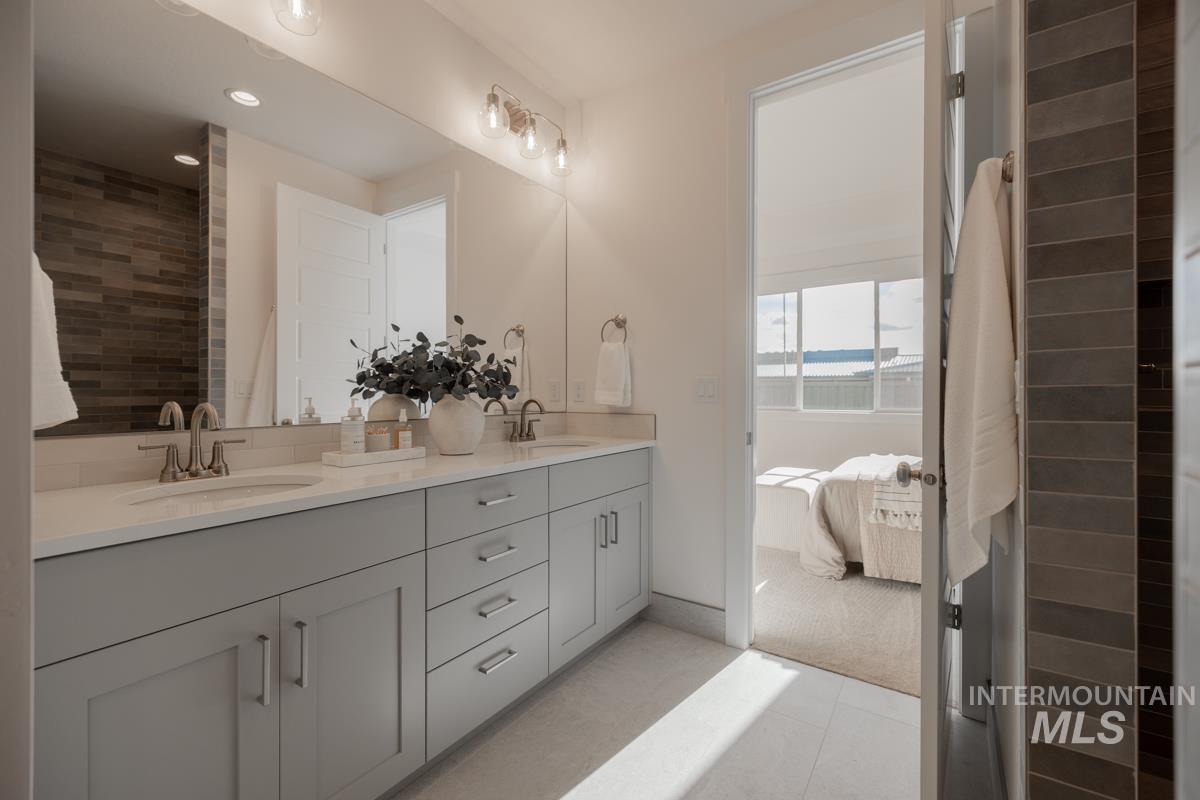 Bathroom with ensuite bath and double vanity