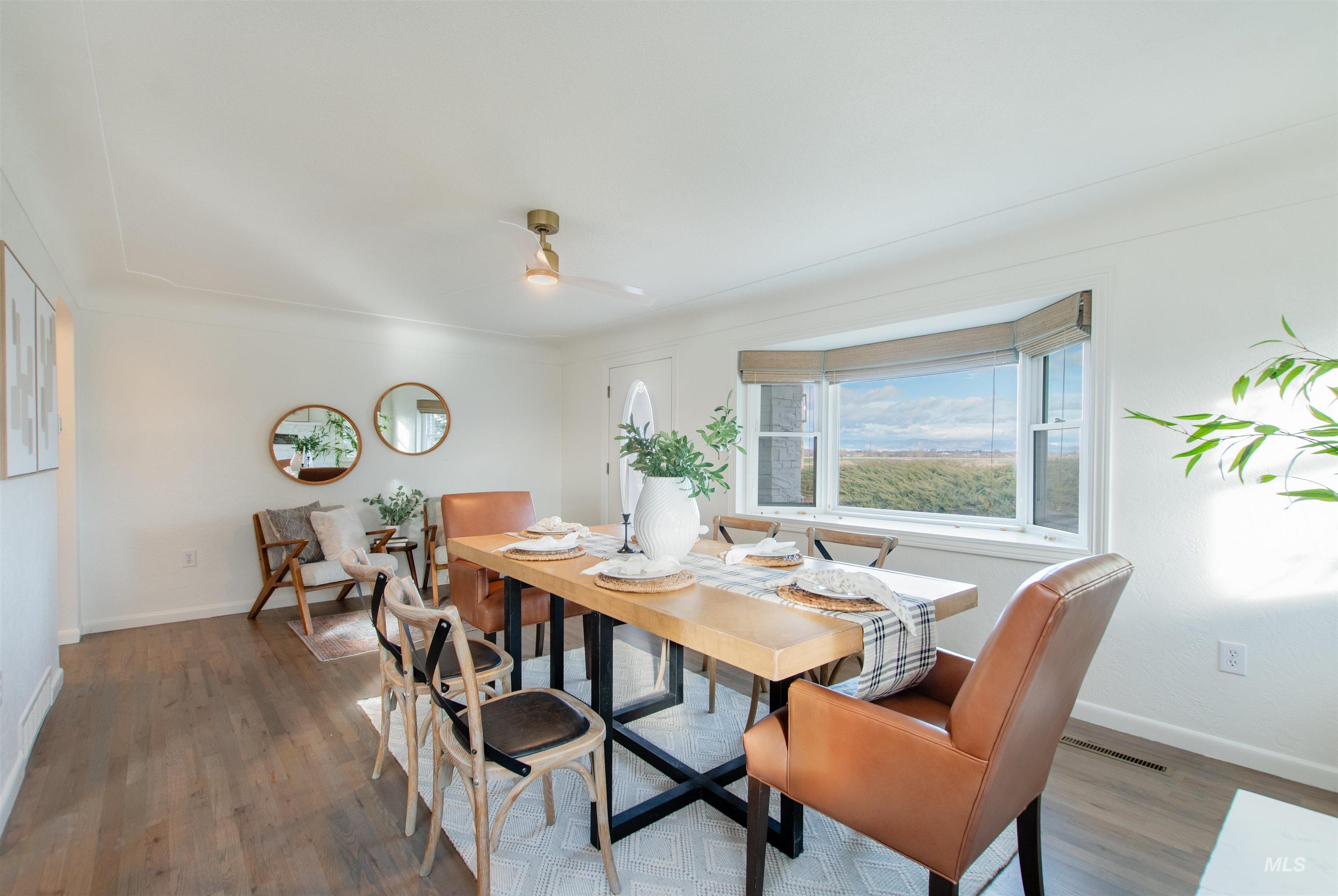 Dining room featuring wood finished floors