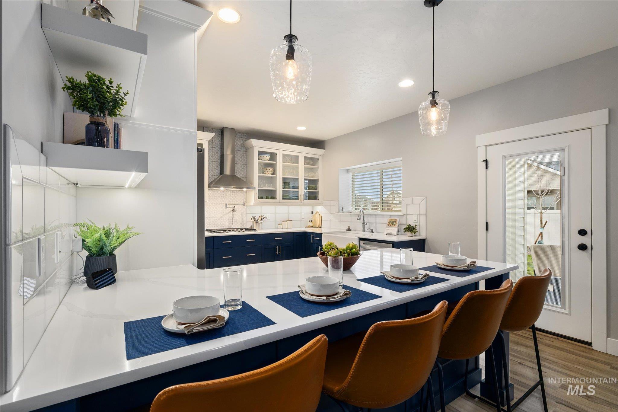 Dining space featuring light wood-style floors and recessed lighting