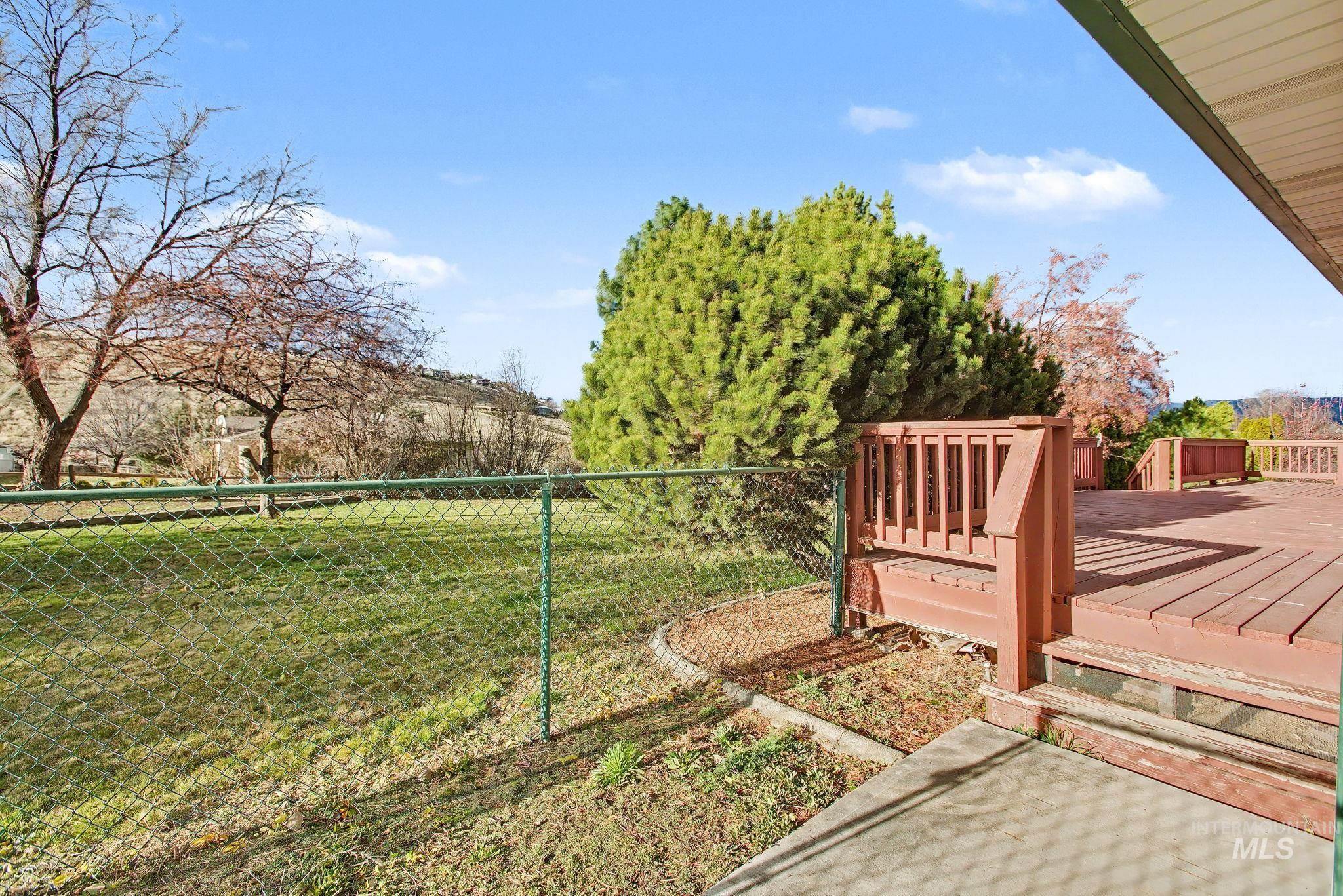 View of yard featuring a deck