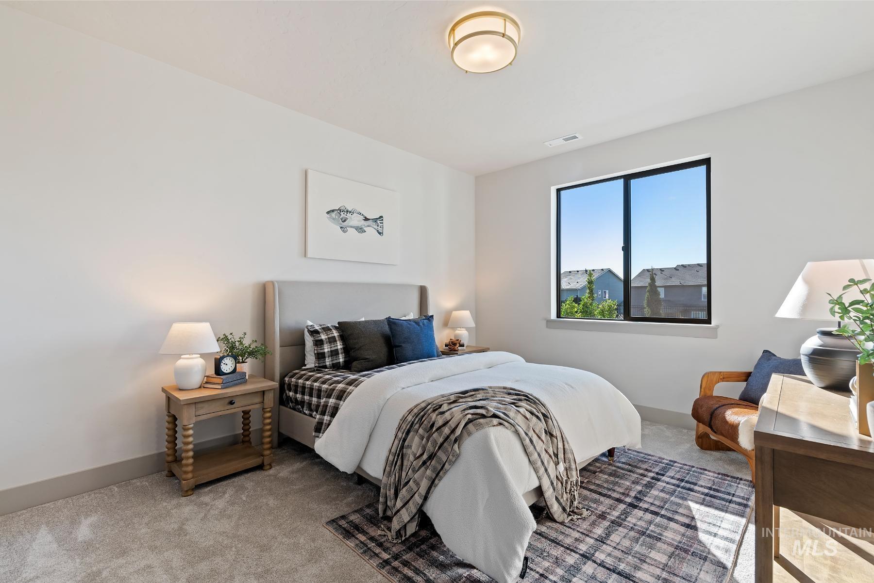 Bedroom featuring carpet flooring