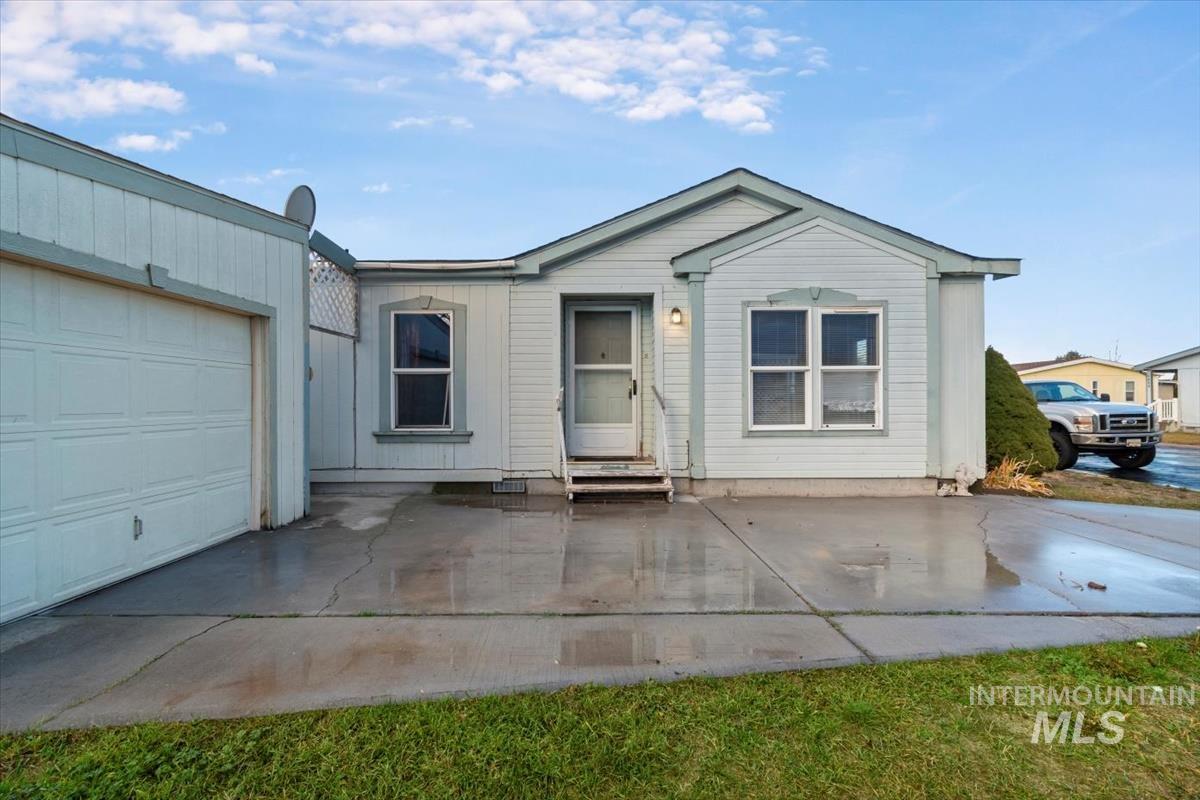 View of front facade with a patio