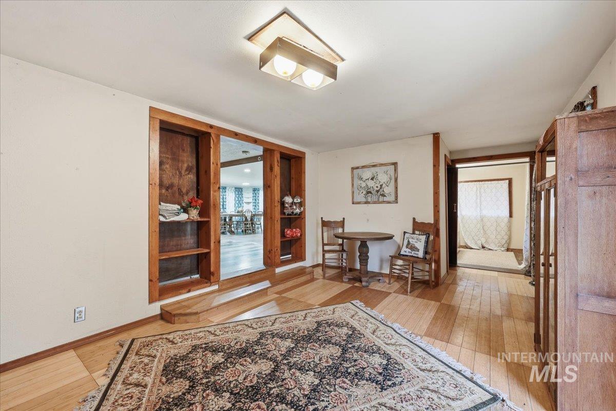 Living area featuring light wood-style flooring