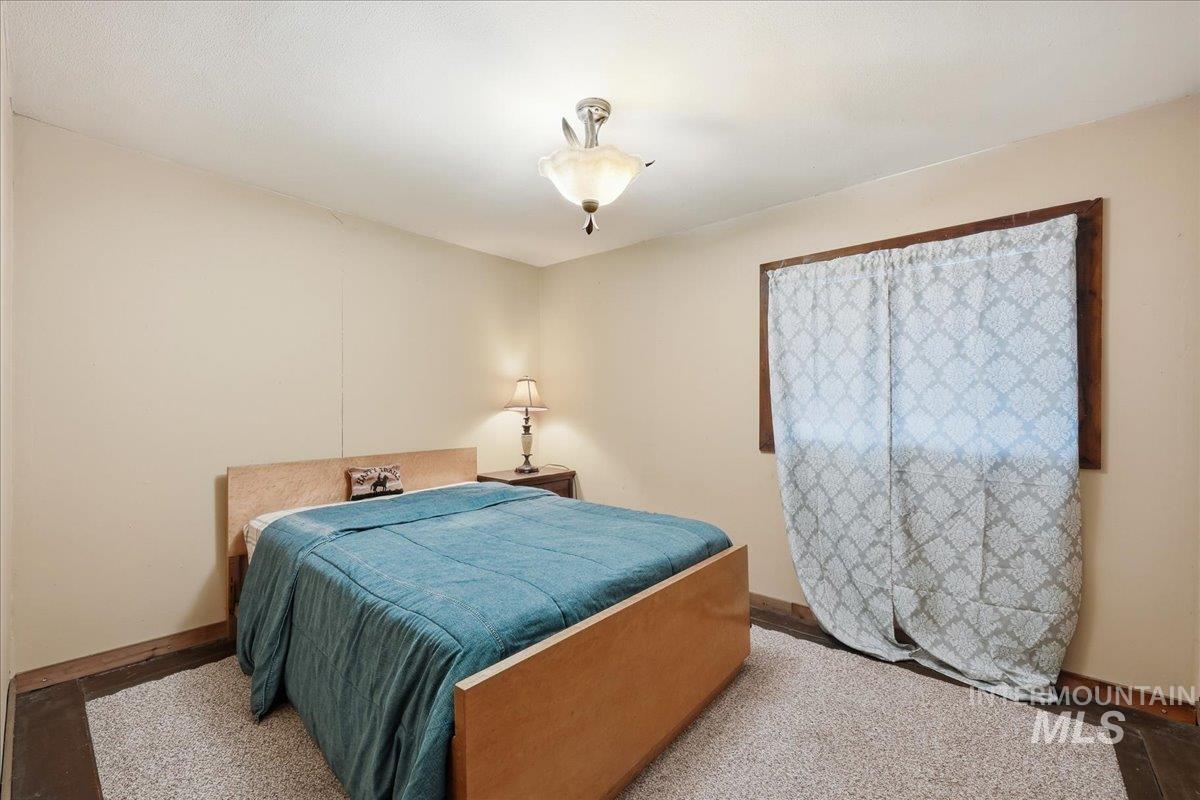 Bedroom with baseboards