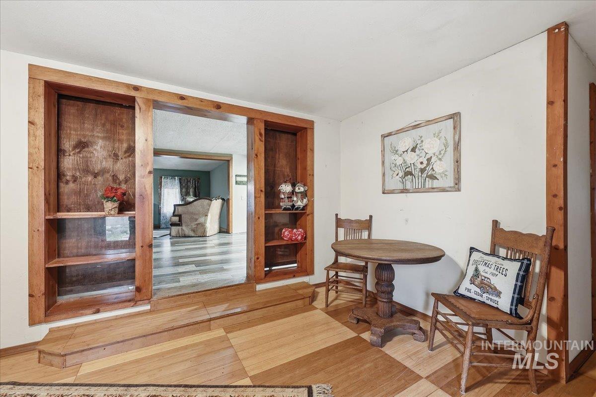 Living area with wood finished floors