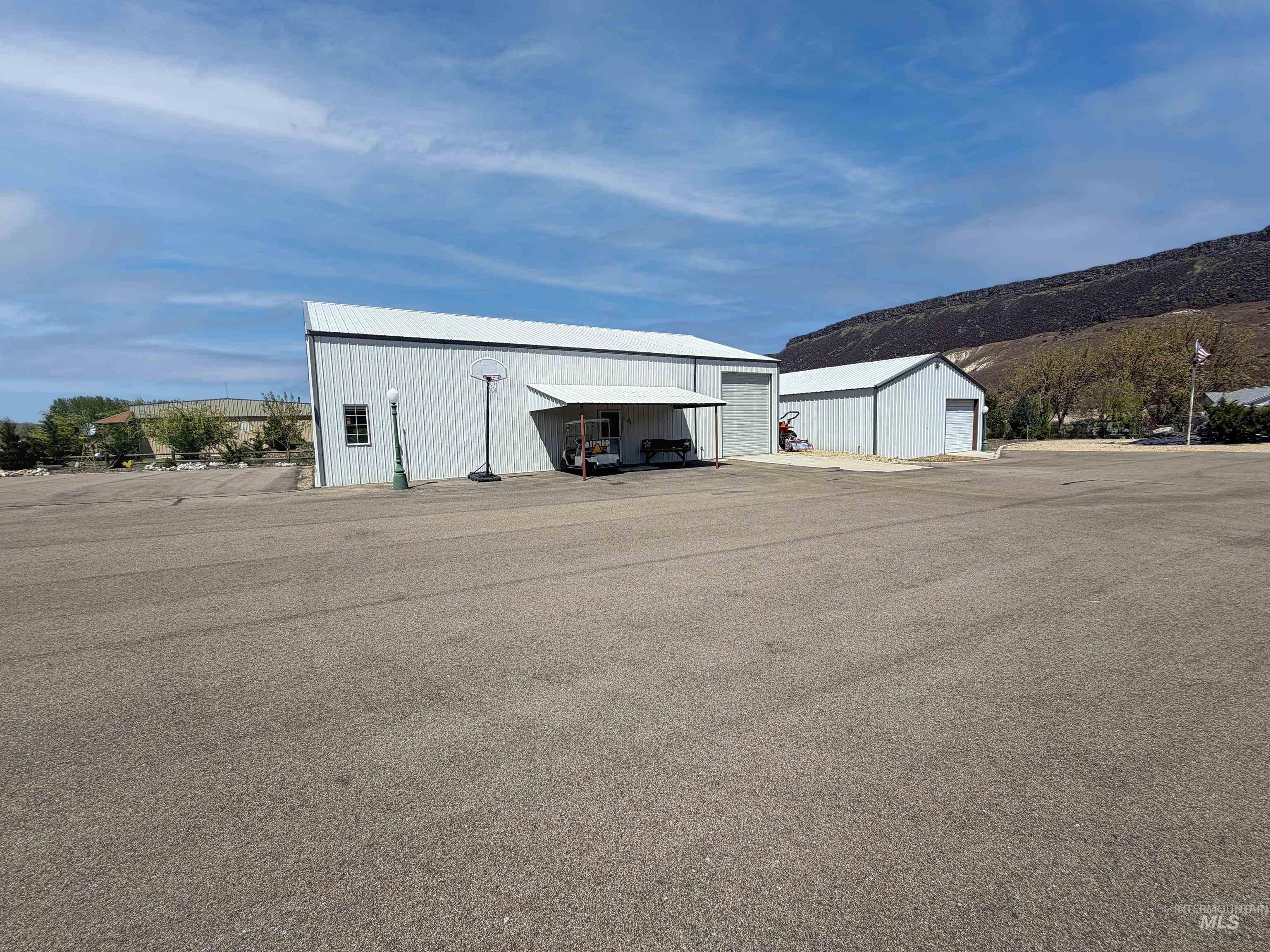 10142 Airpark Loop Rd, Melba, Idaho 83641, 3 Bedrooms, 2 Bathrooms, Residential For Sale, Price $1,200,000,MLS 98970197