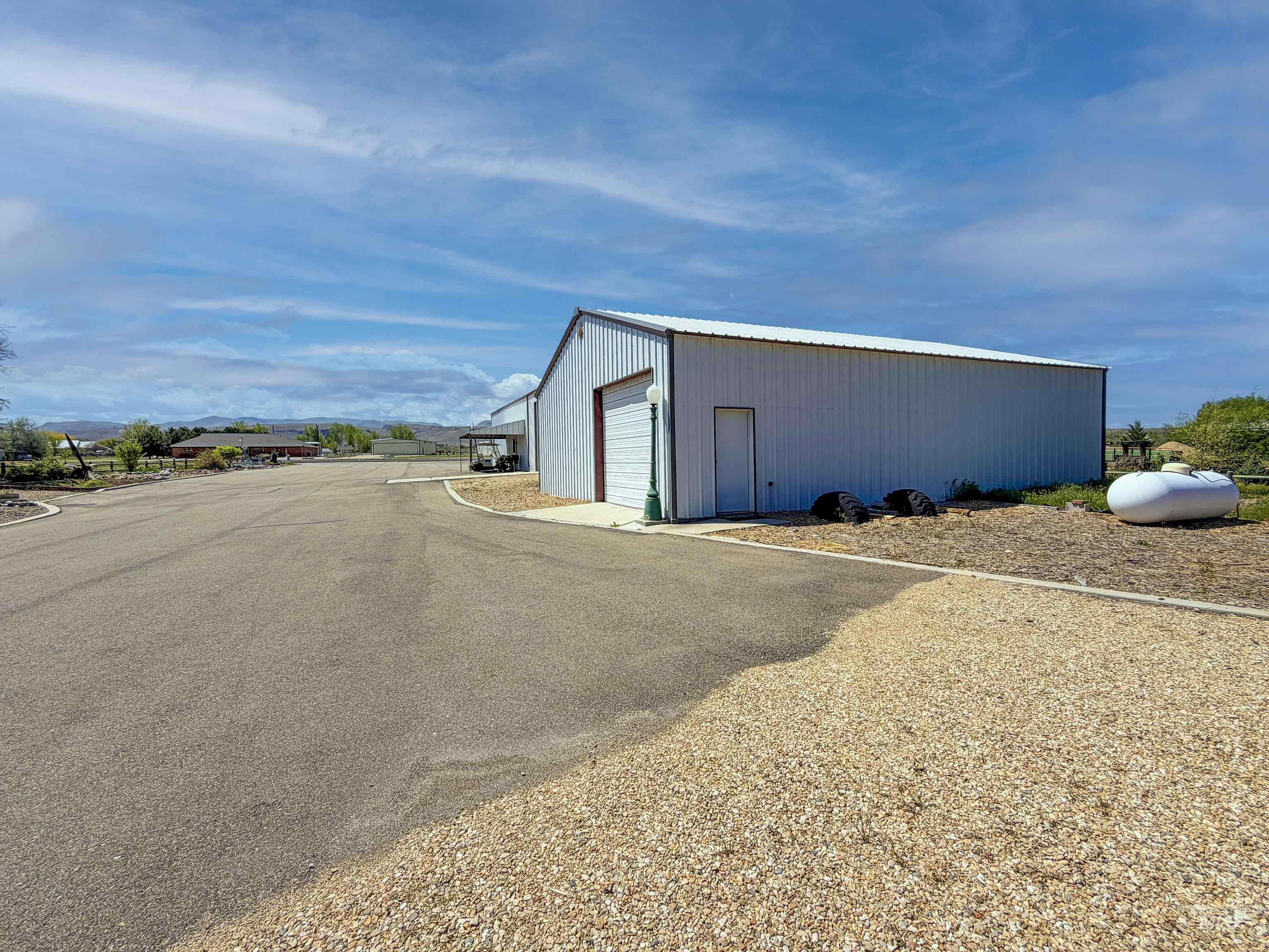 10142 Airpark Loop Rd, Melba, Idaho 83641, 3 Bedrooms, 2 Bathrooms, Residential For Sale, Price $1,200,000,MLS 98970197