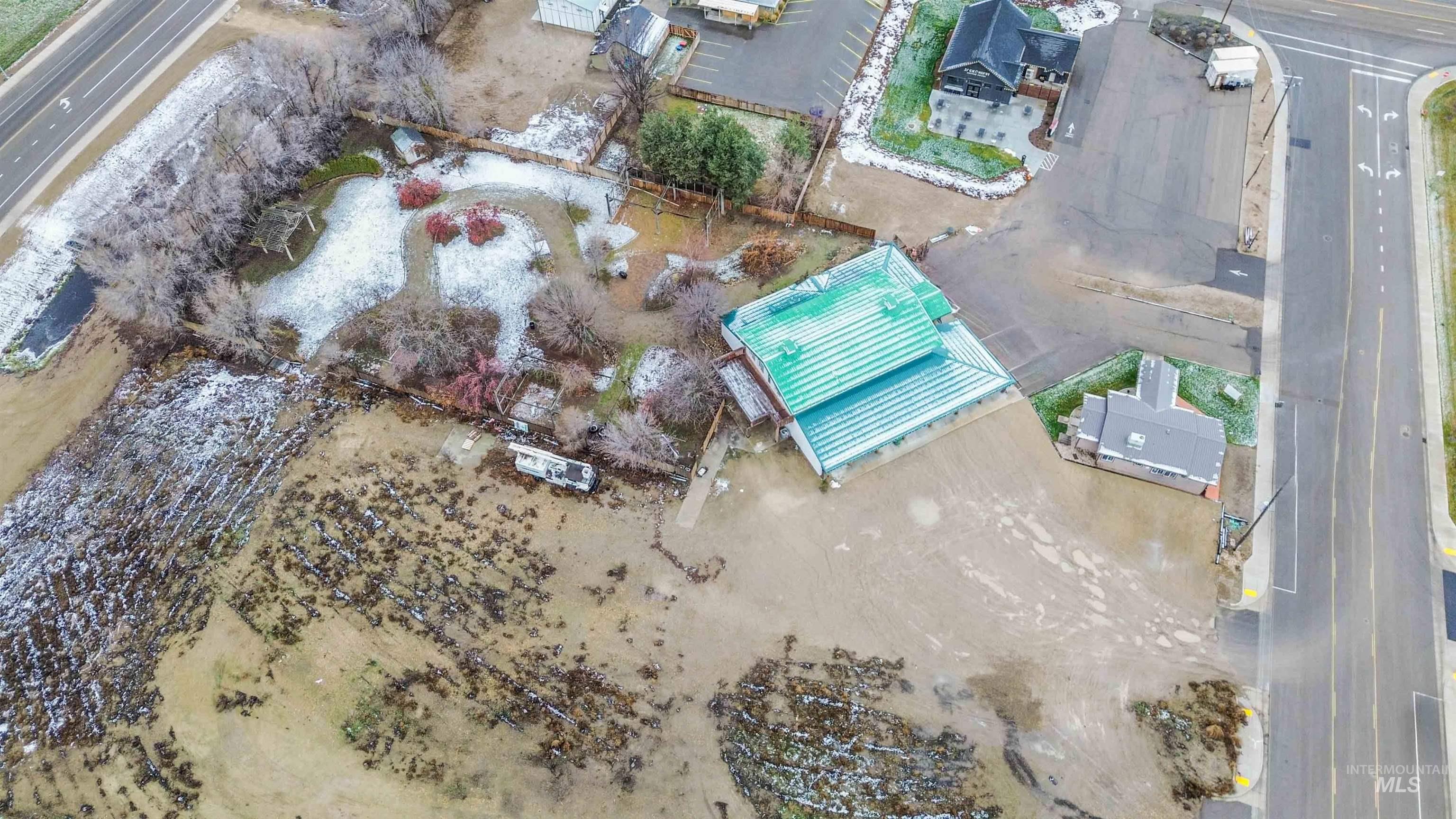 Aerial view of property and surrounding area