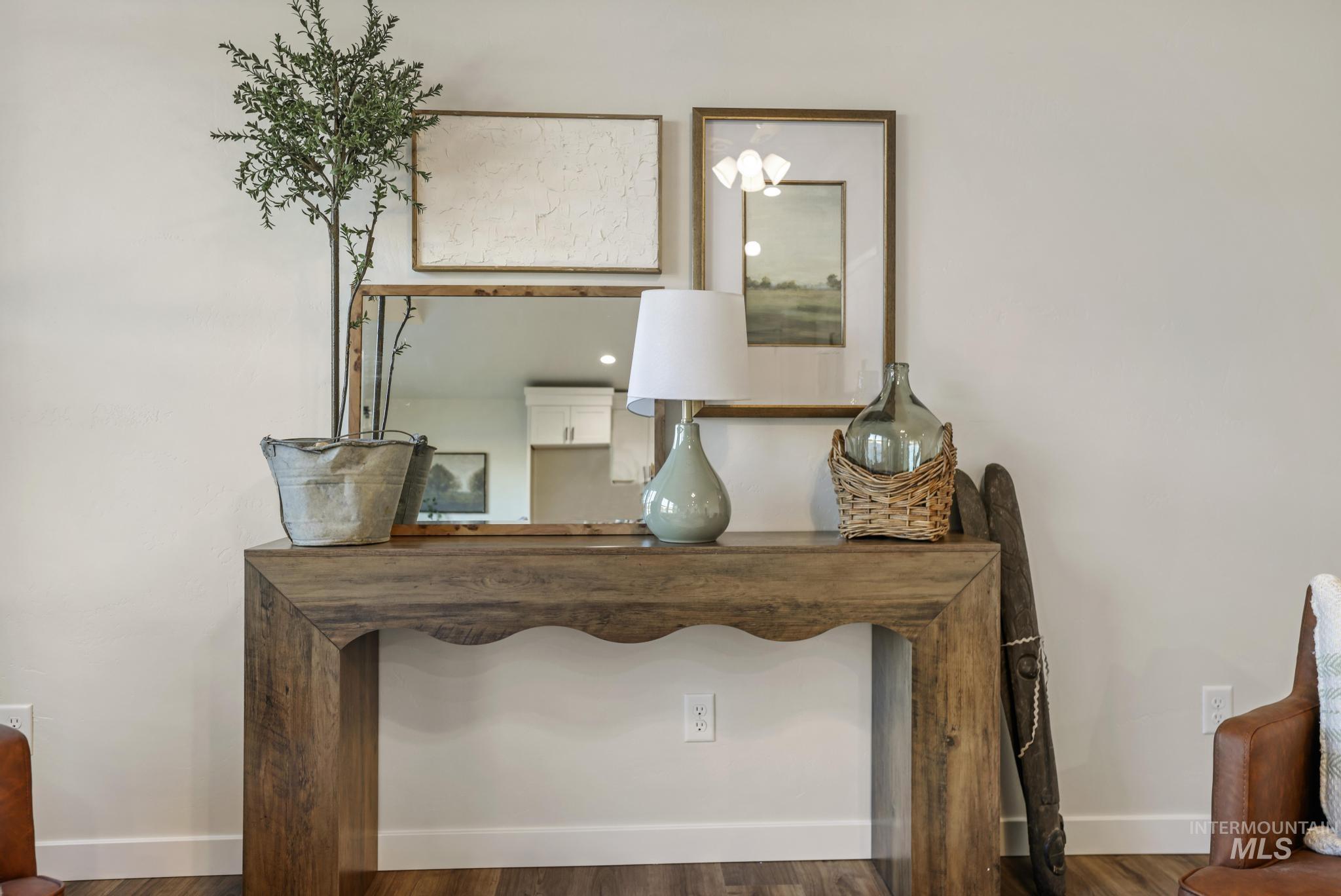Detailed view of wood finished floors and baseboards