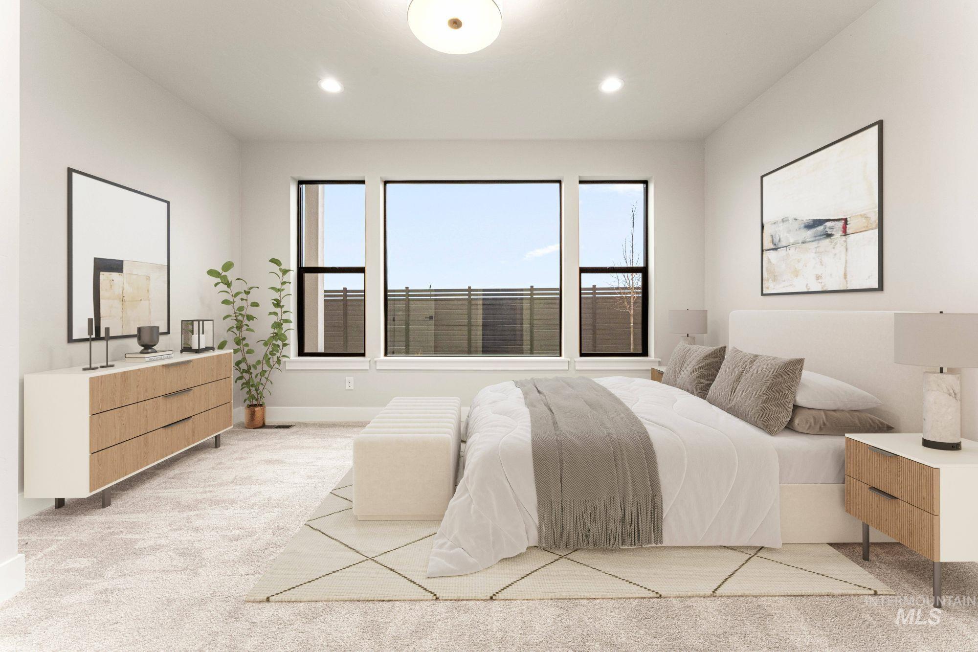Bedroom featuring light carpet and recessed lighting