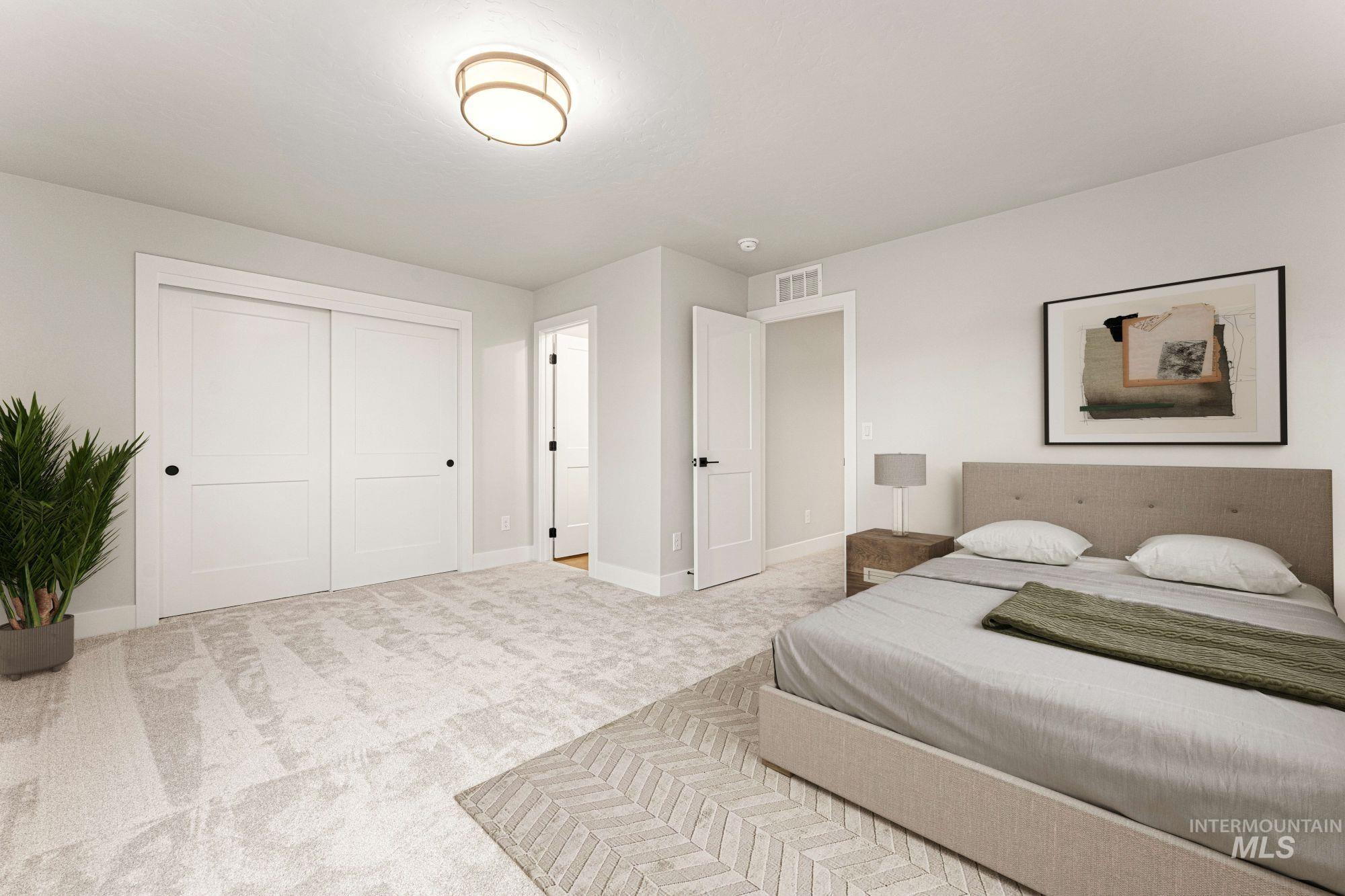 Bedroom with carpet flooring and a closet