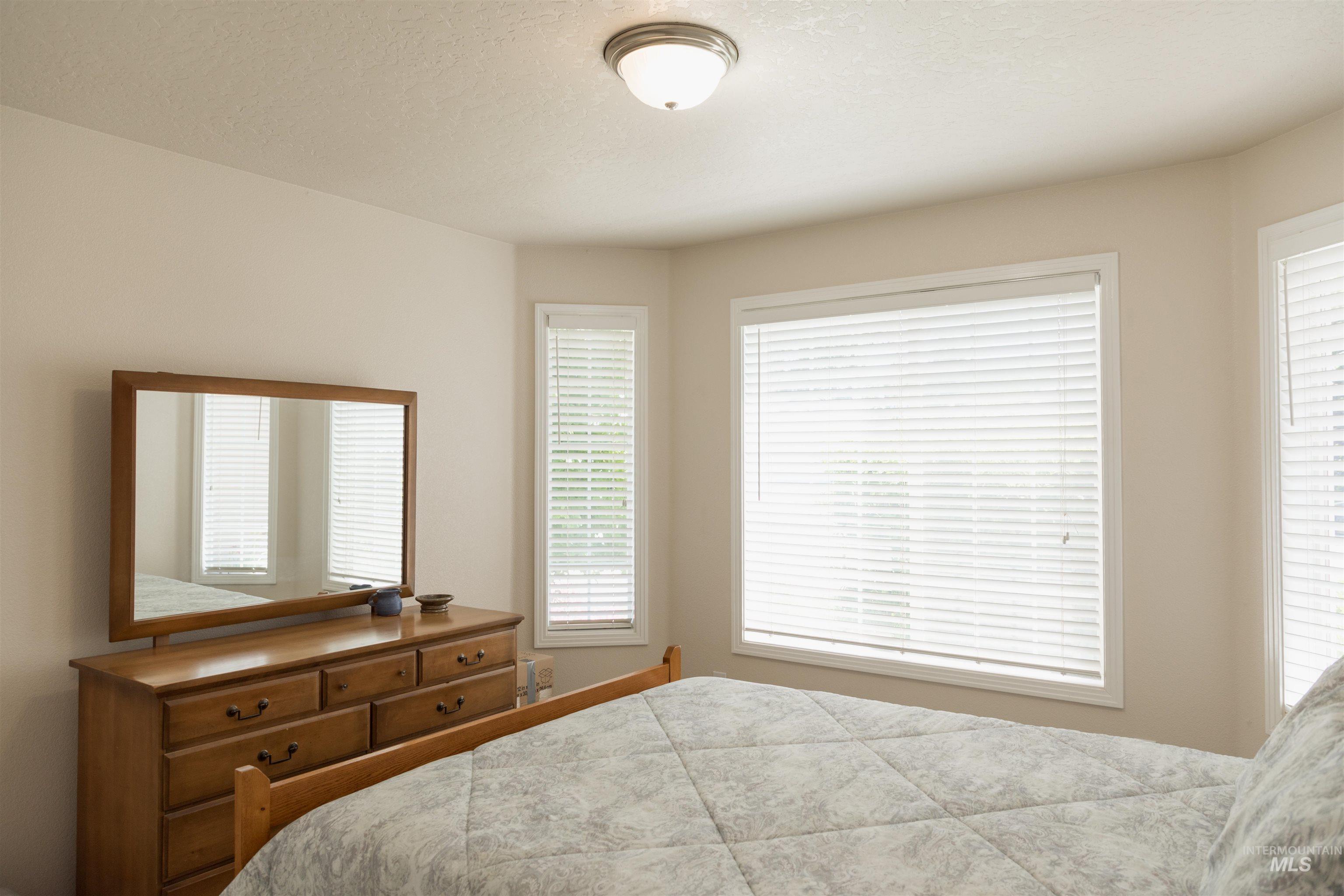 Bedroom featuring a textured ceiling