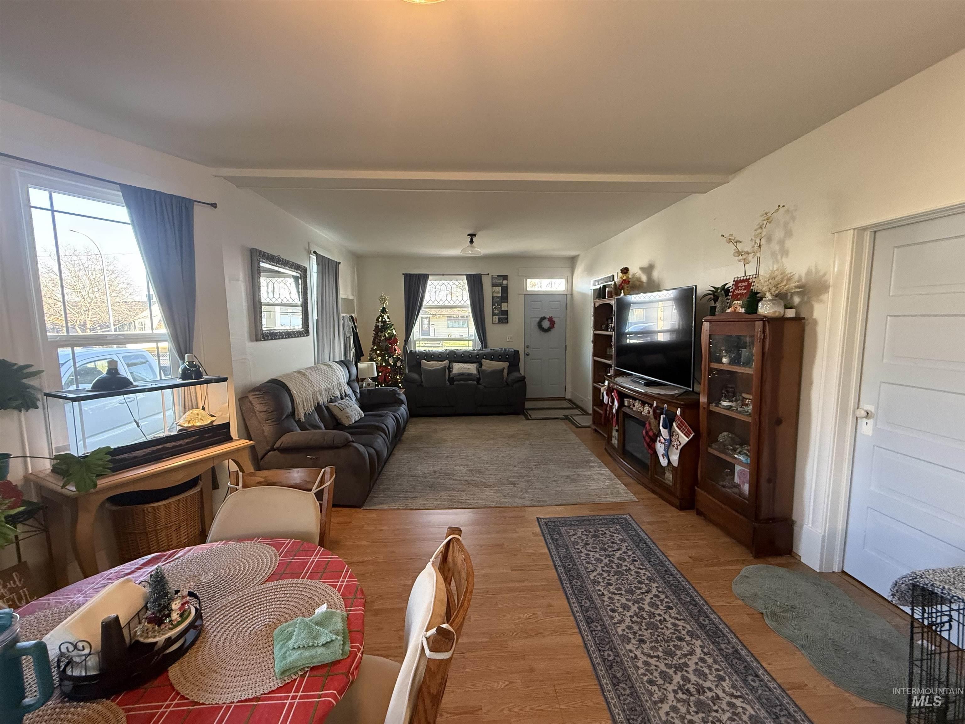 Living area featuring wood finished floors