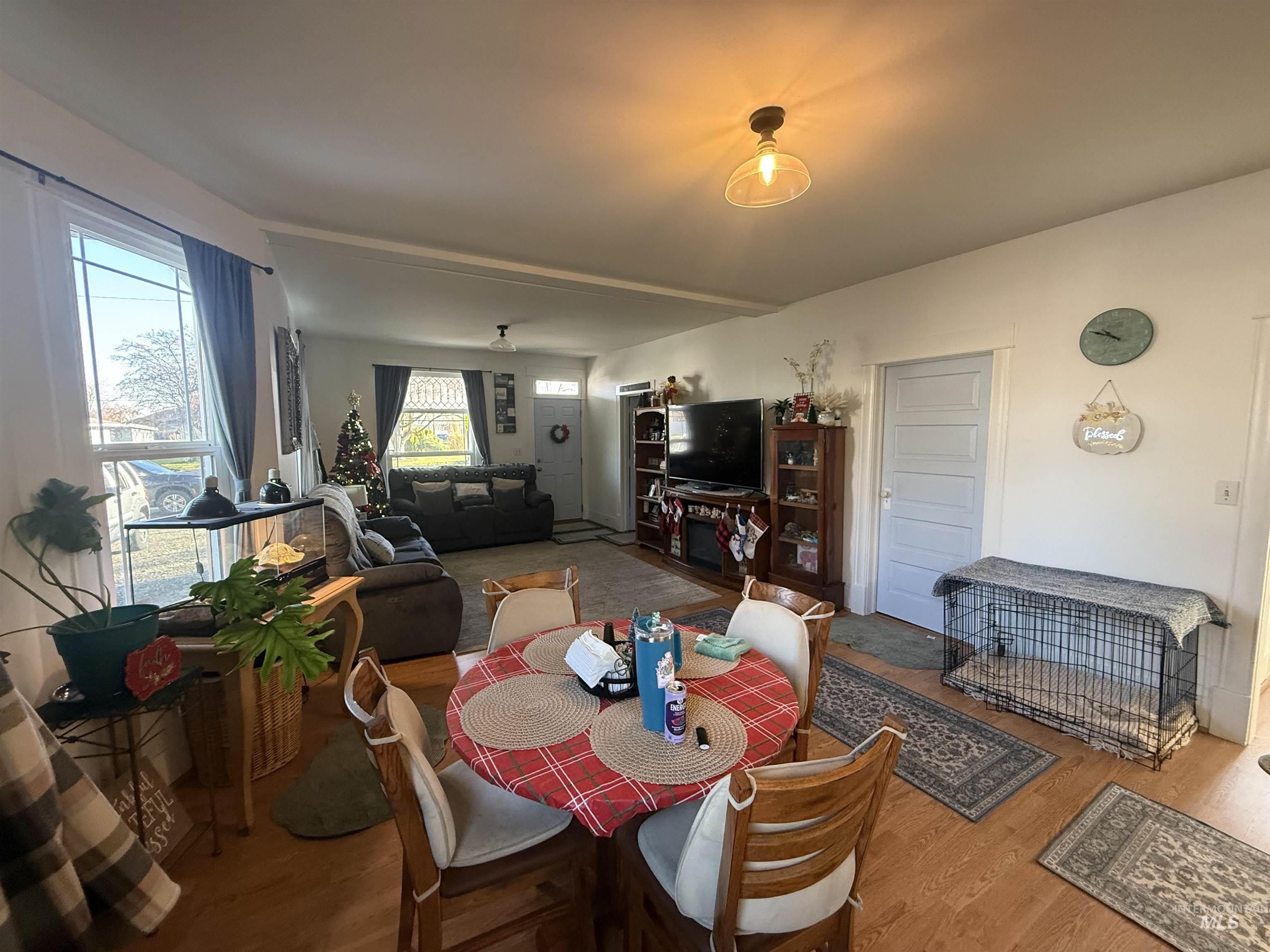 Dining area with wood finished floors