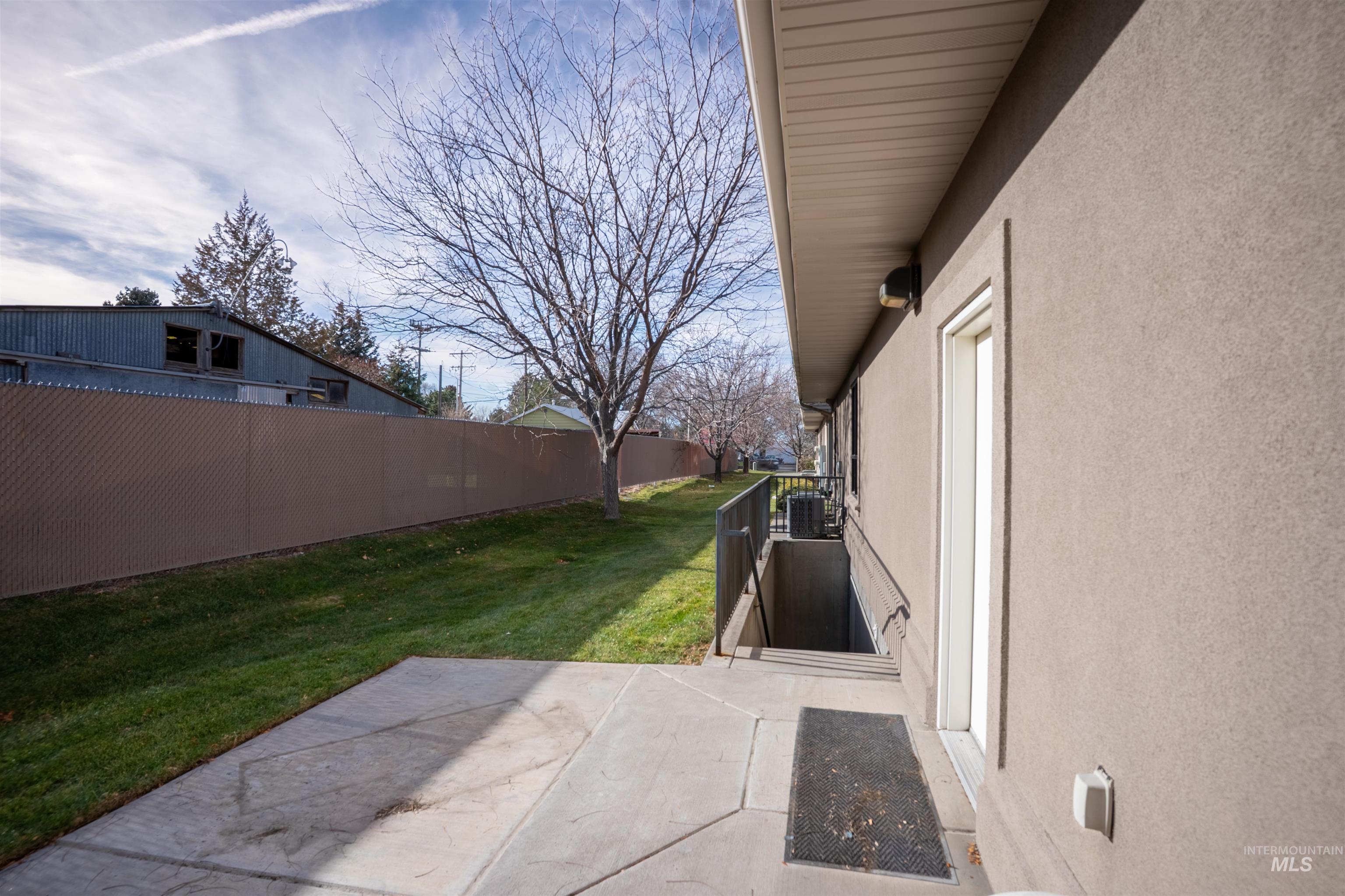 View of yard with a patio