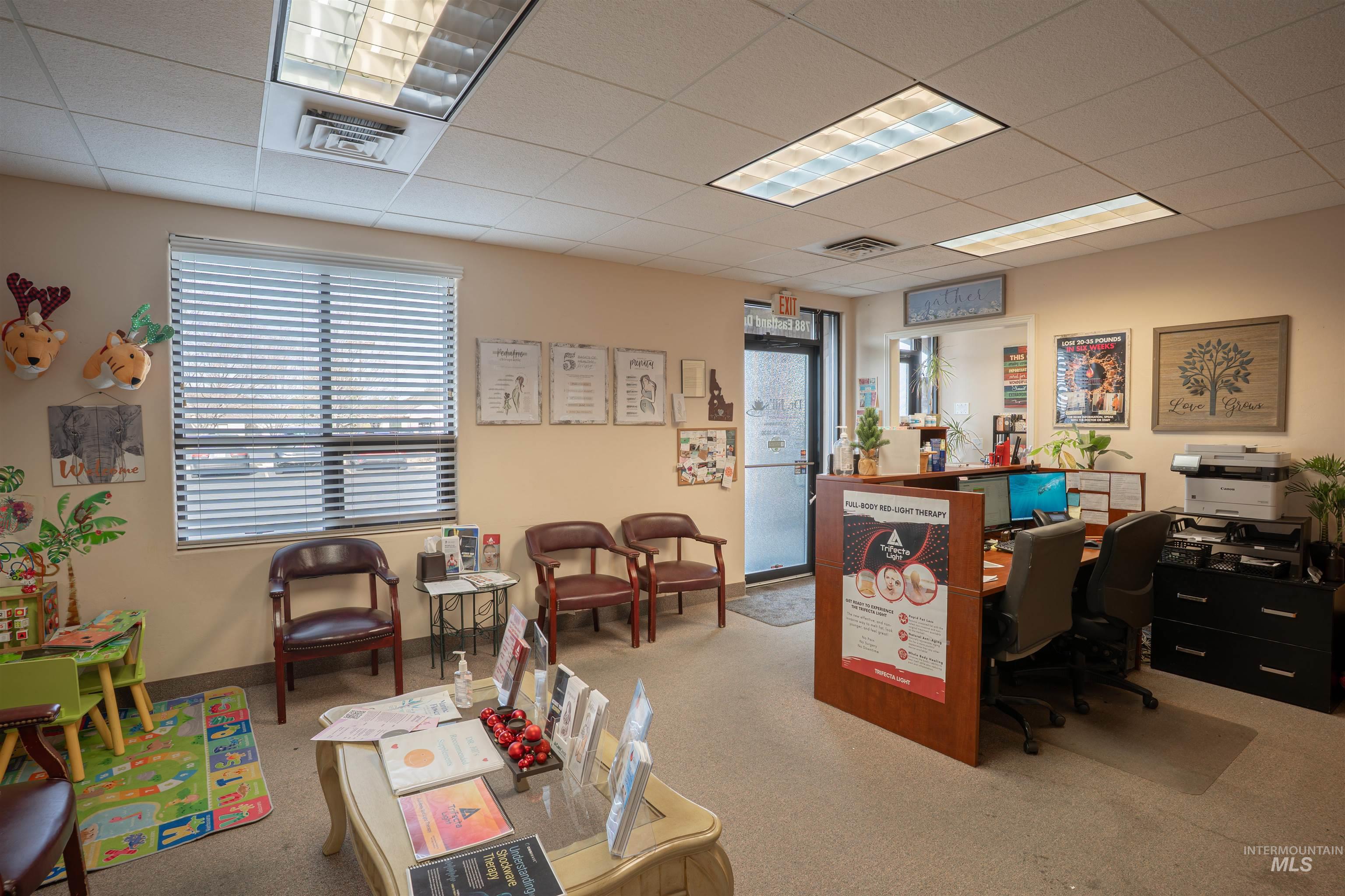 Home office with a paneled ceiling