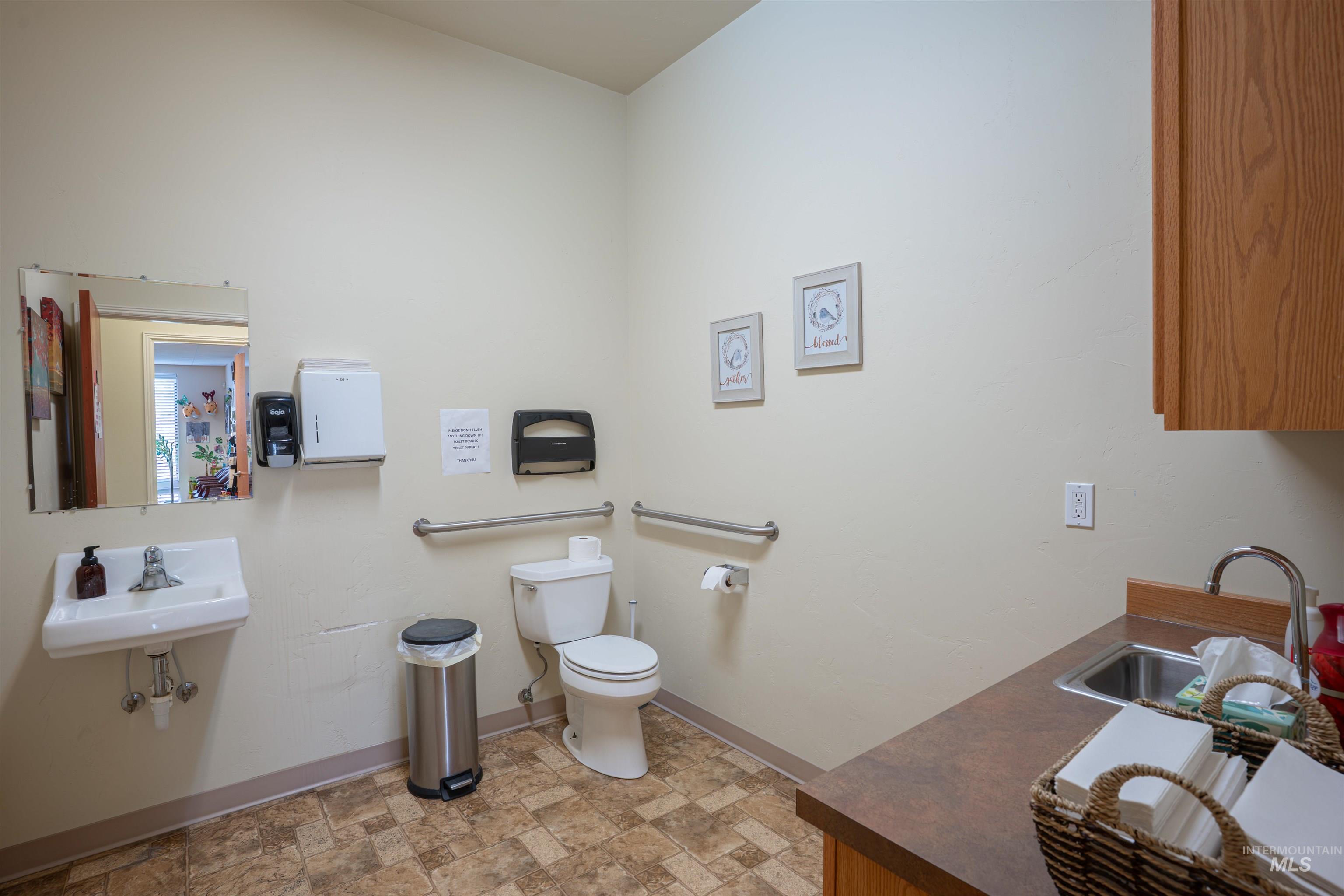 Bathroom with toilet and vanity