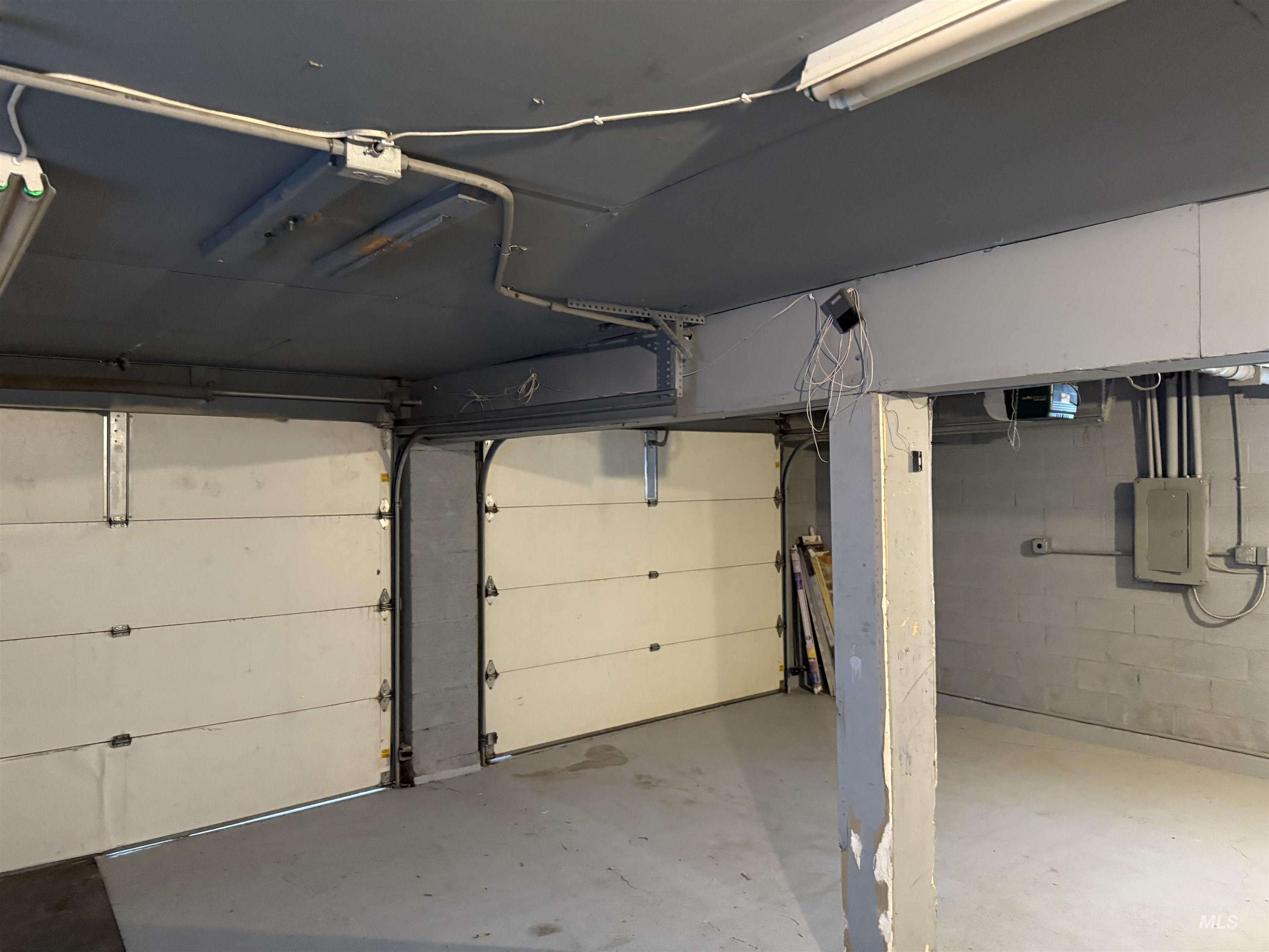 Garage with concrete block wall and electric panel