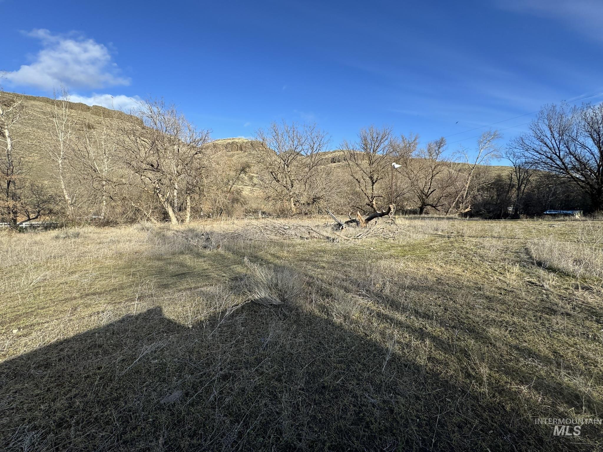 View of yard with a view of countryside