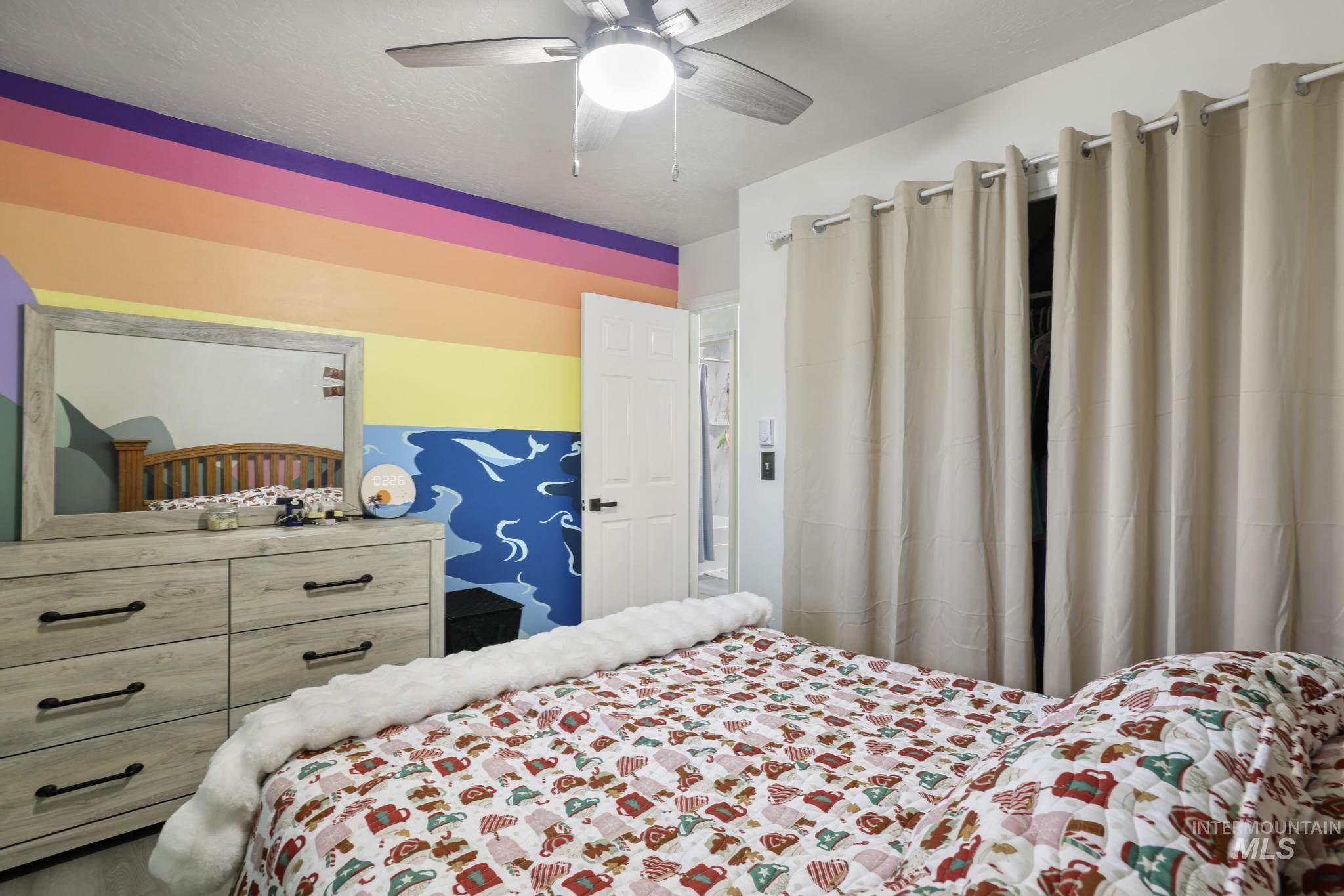 Bedroom with a ceiling fan