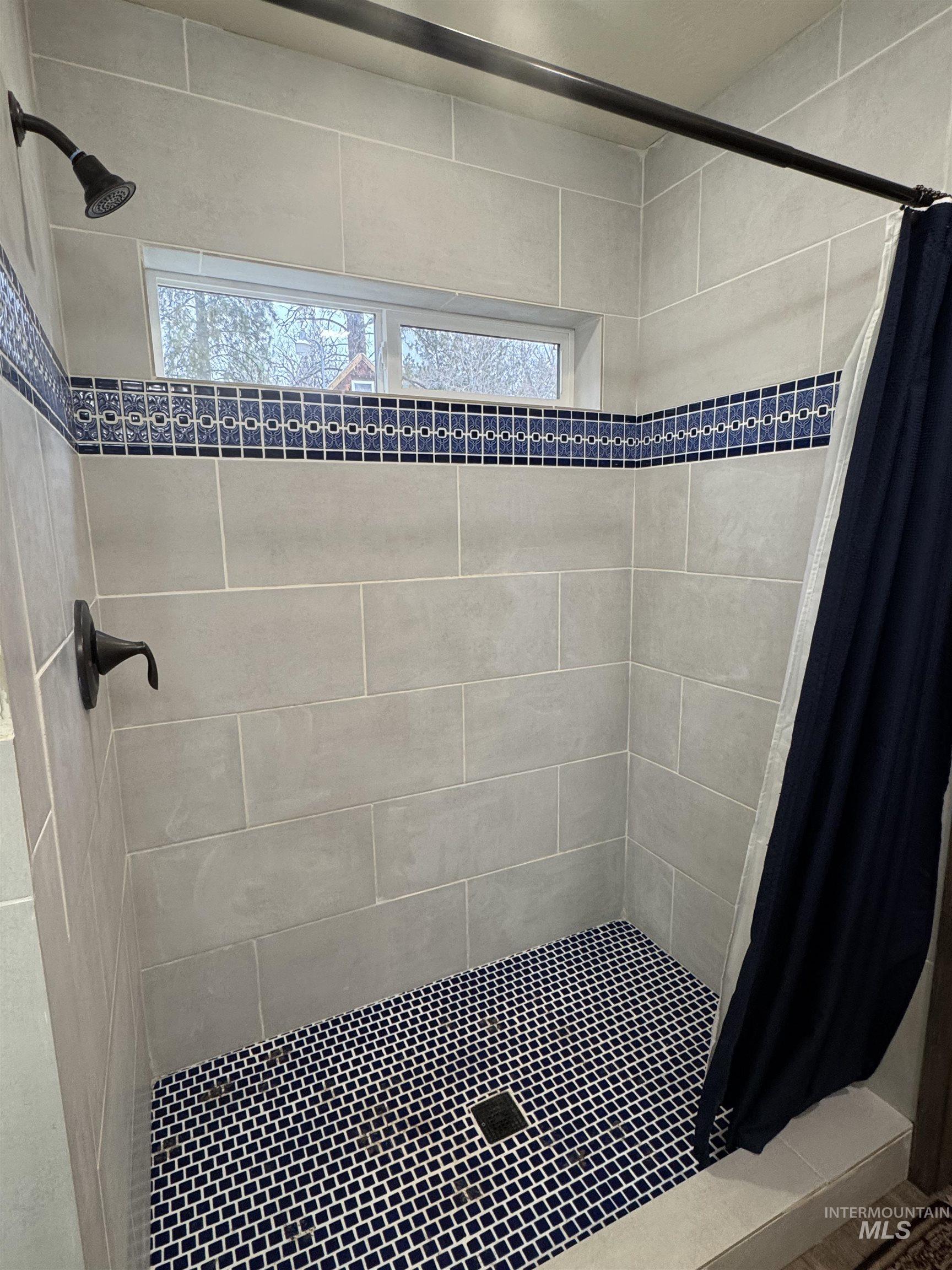 Bathroom featuring a stall shower