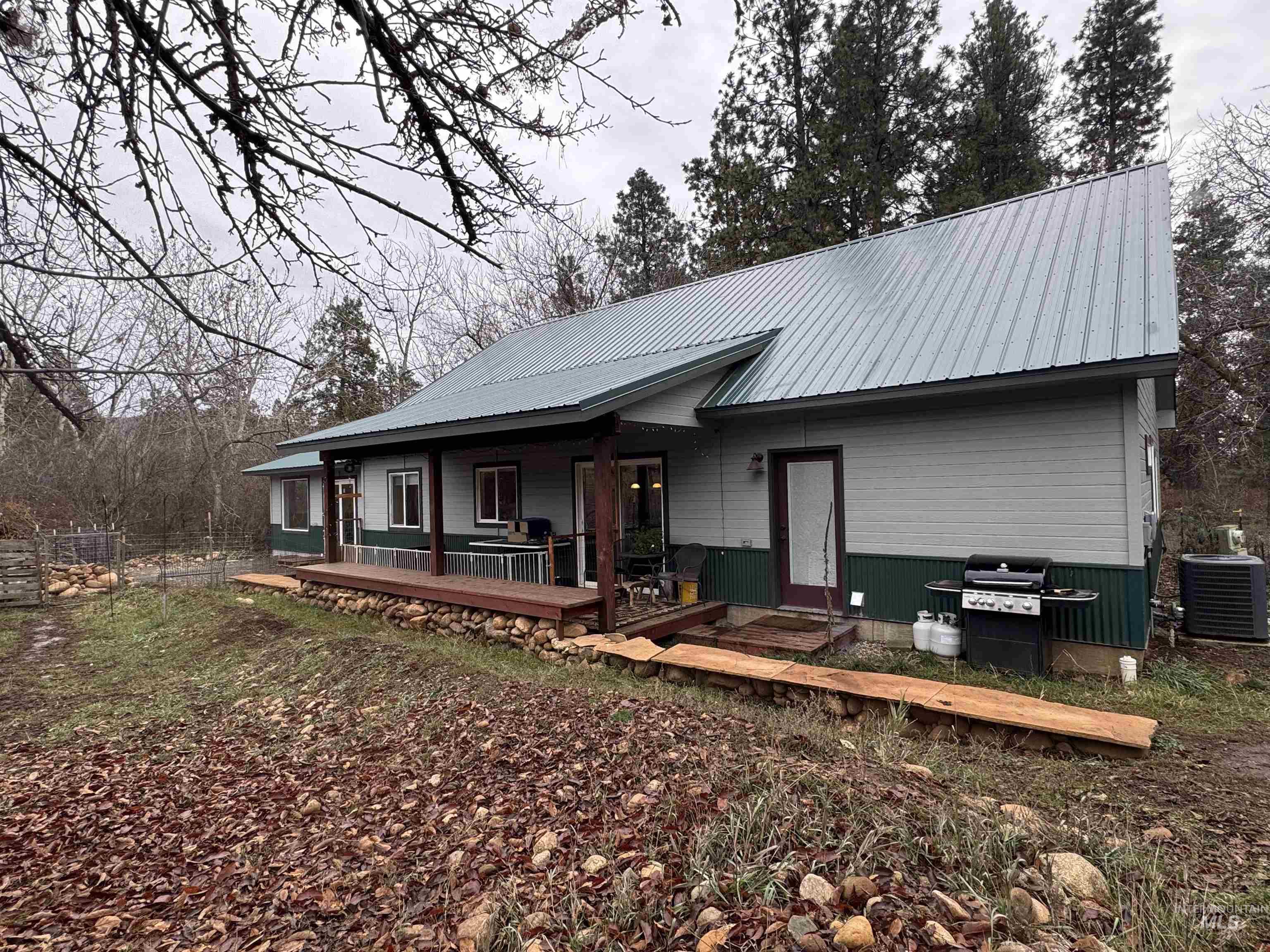 View of front facade with a metal roof