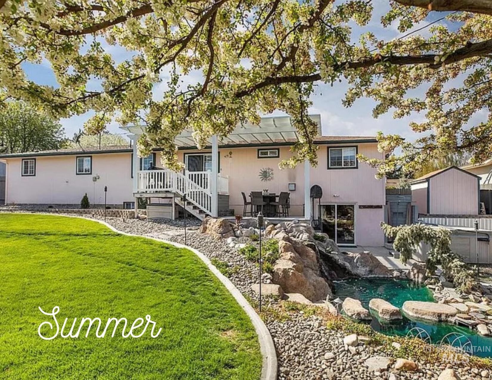 Rear view of property with a patio area and a yard