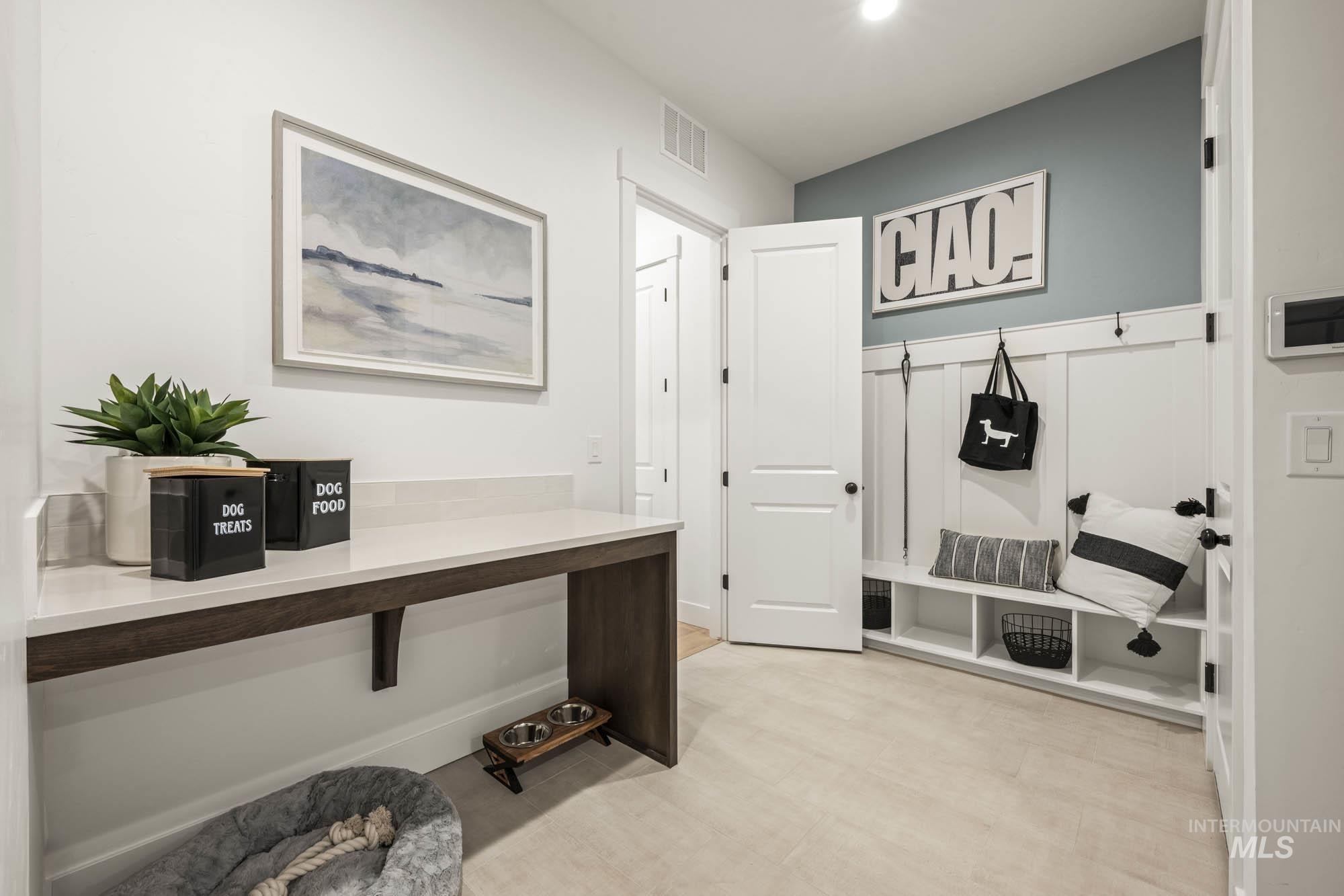 Mudroom with light floors