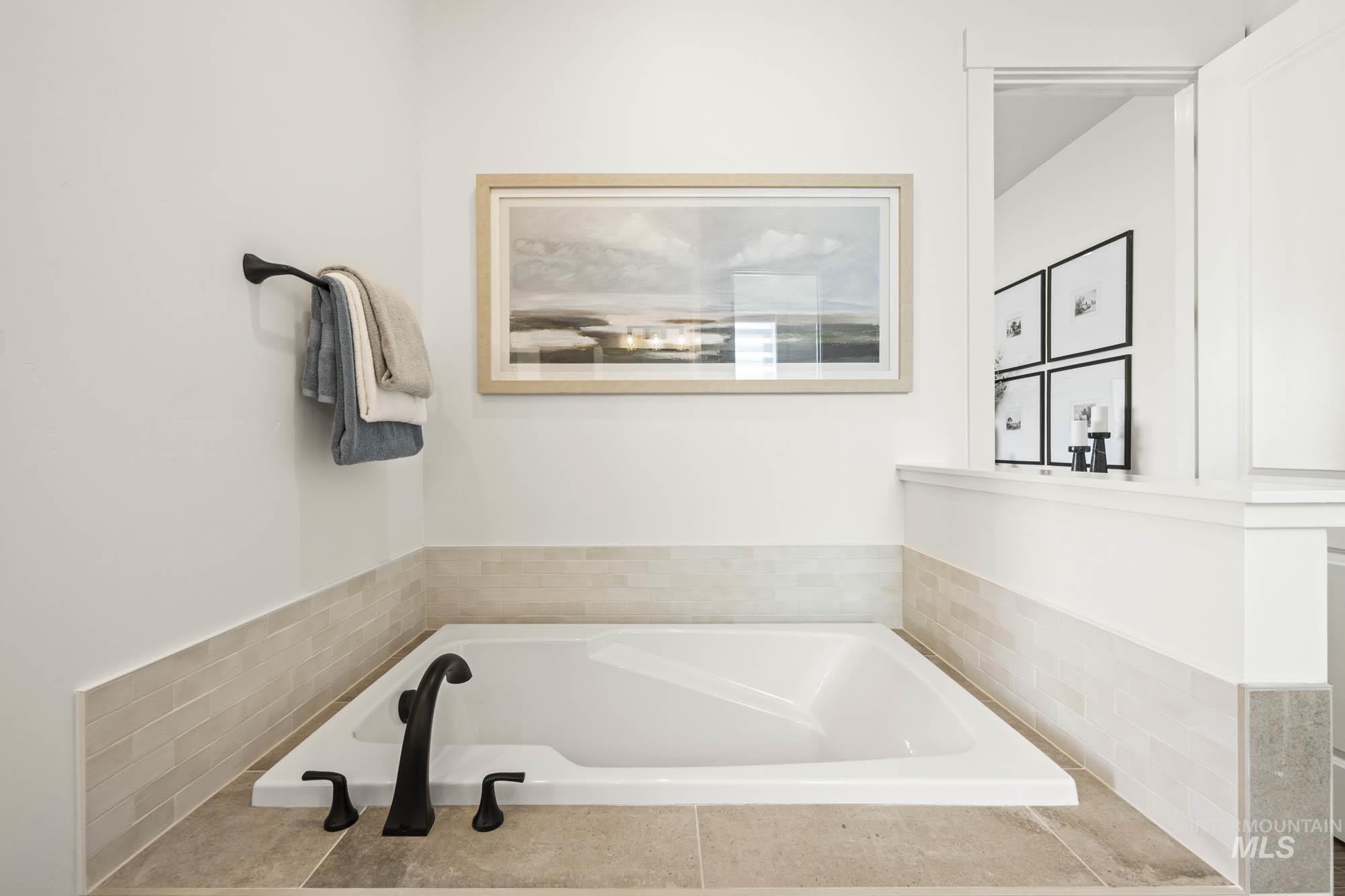 Full bath with a garden tub