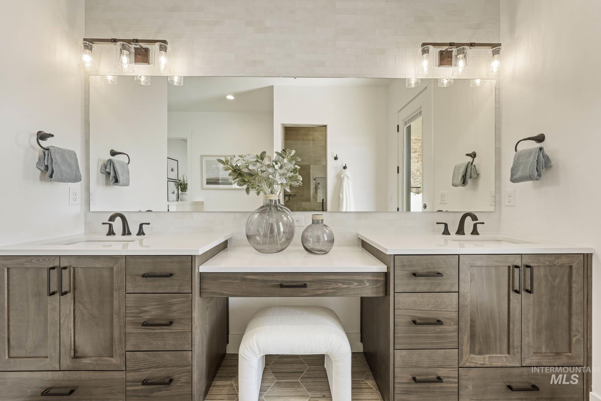 Full bathroom with two vanities