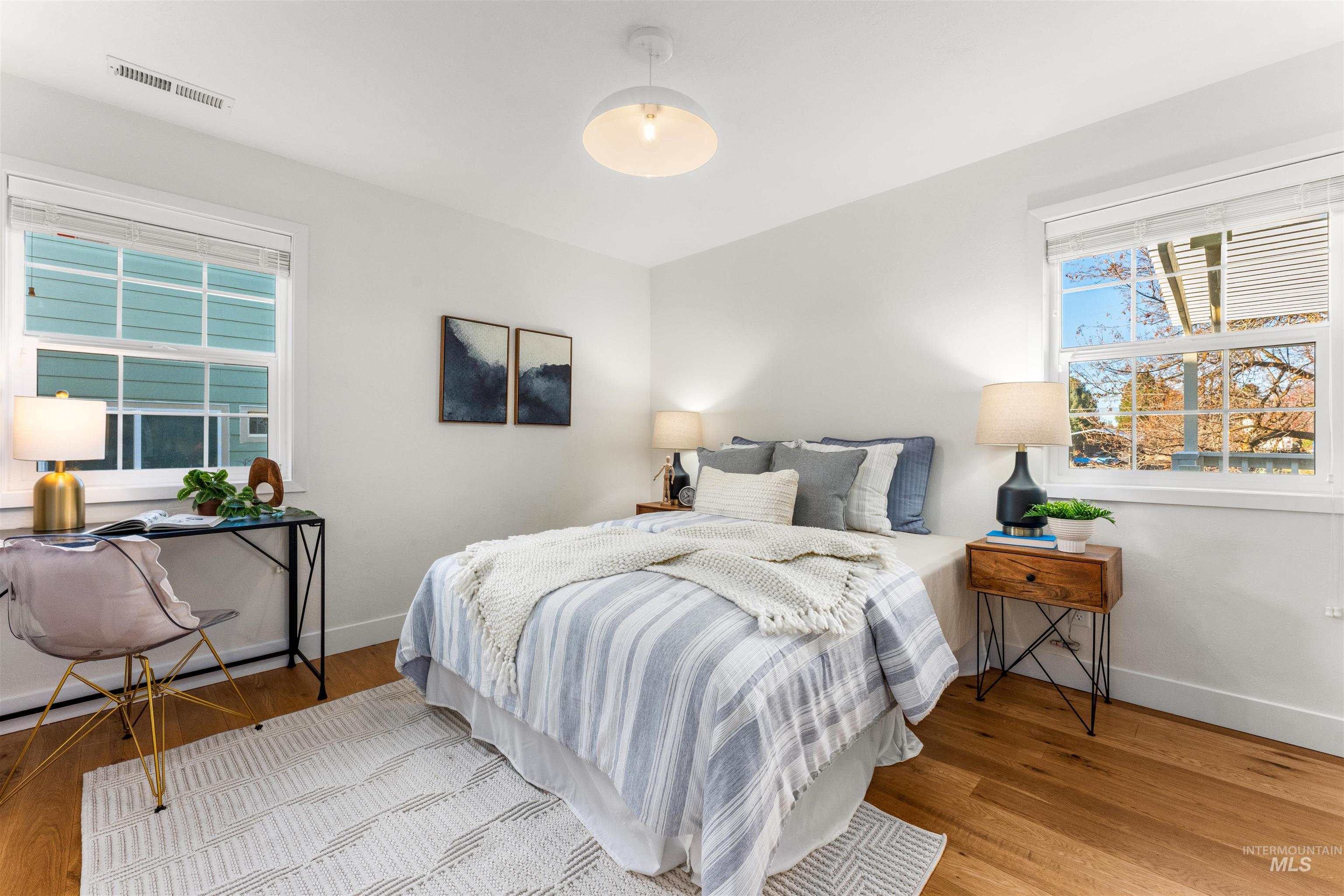 Bedroom with wood finished floors