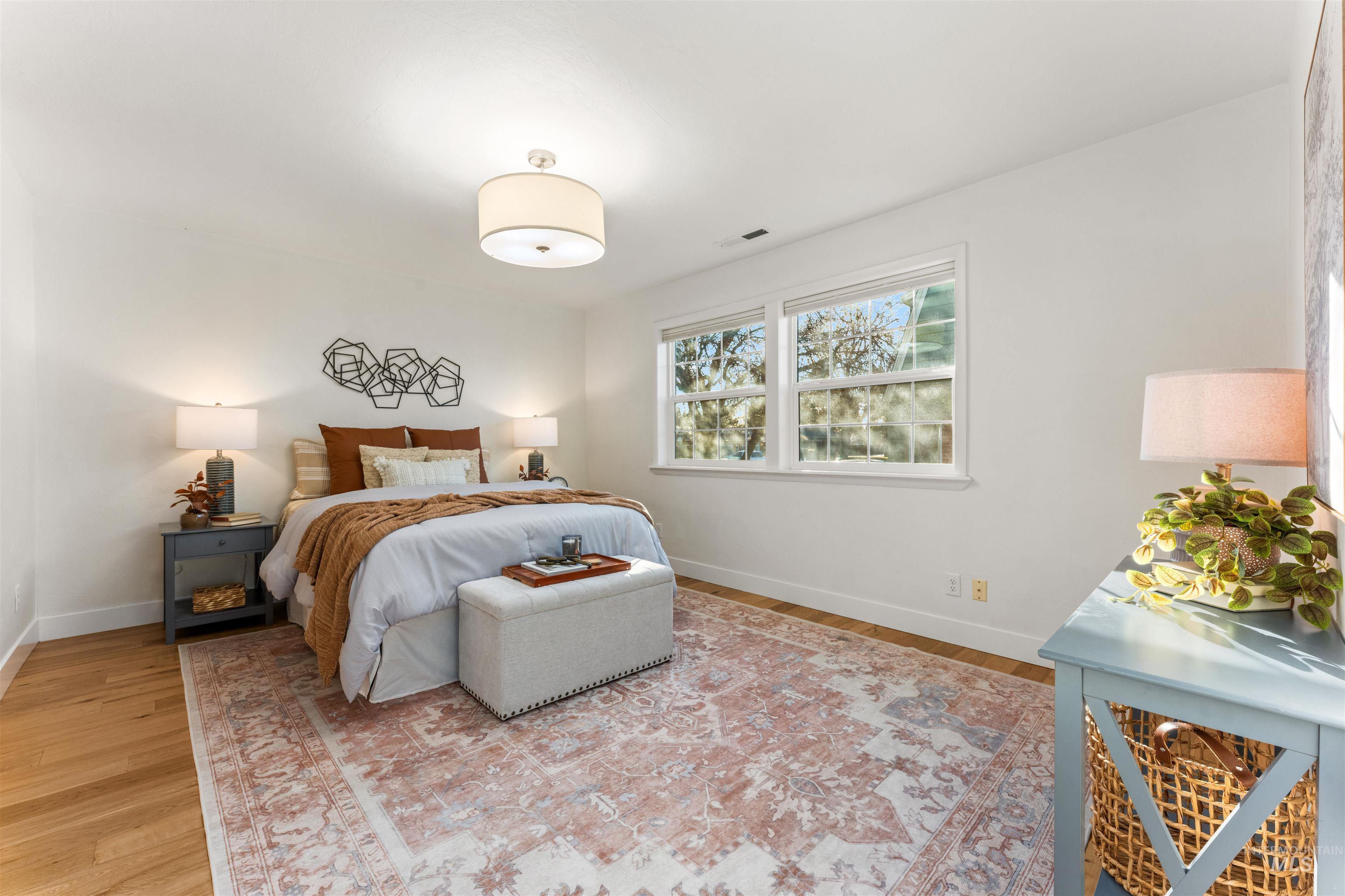 Bedroom featuring light wood-style flooring