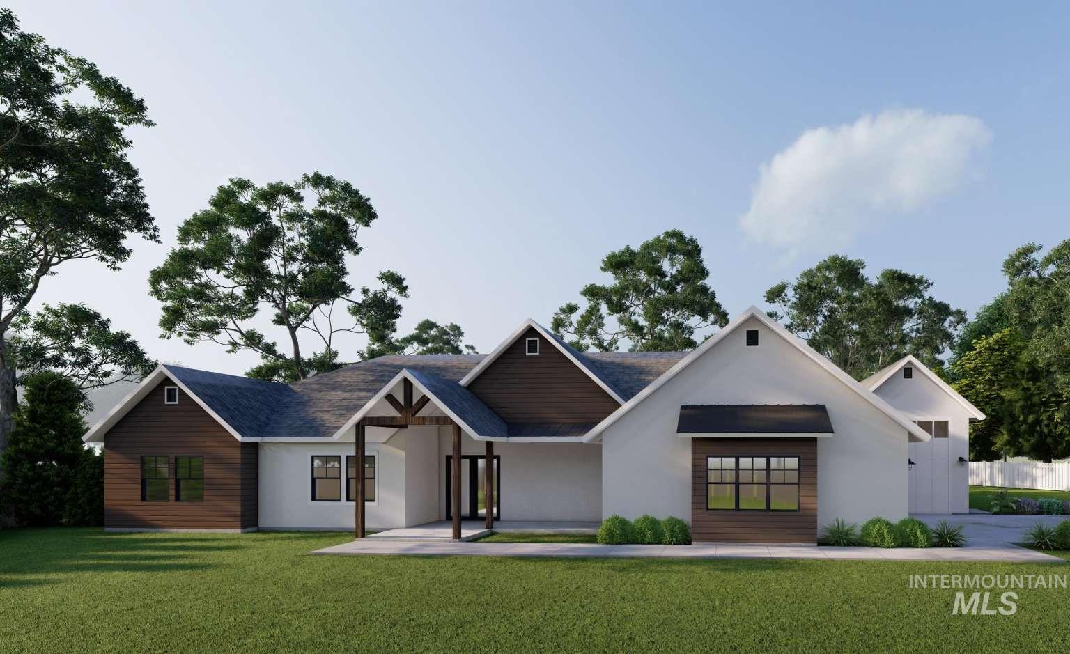 View of front of home featuring a front lawn and stucco siding