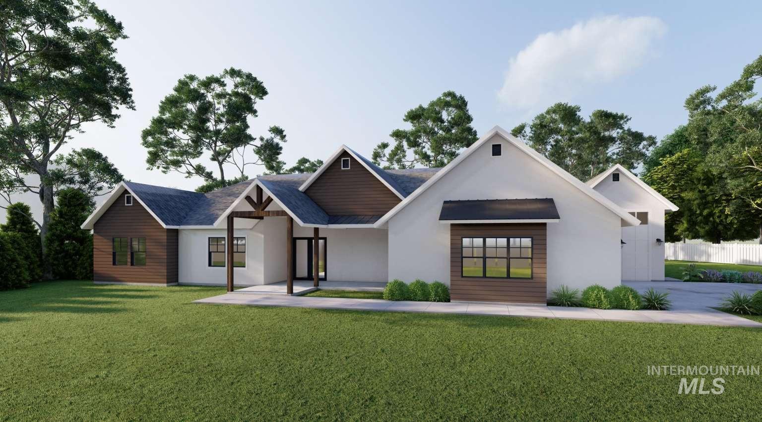 View of front of home featuring stucco siding