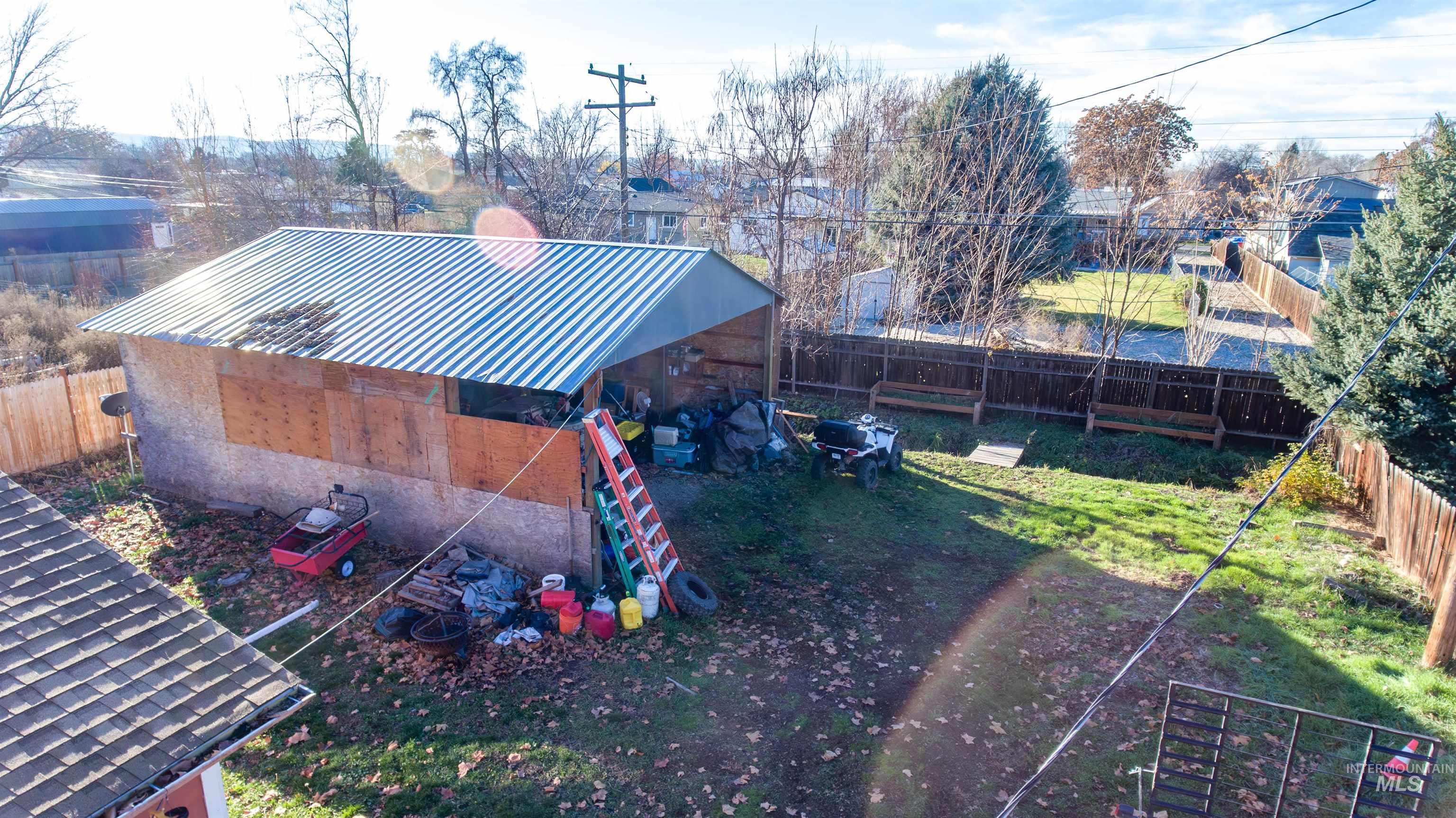 View of fenced backyard