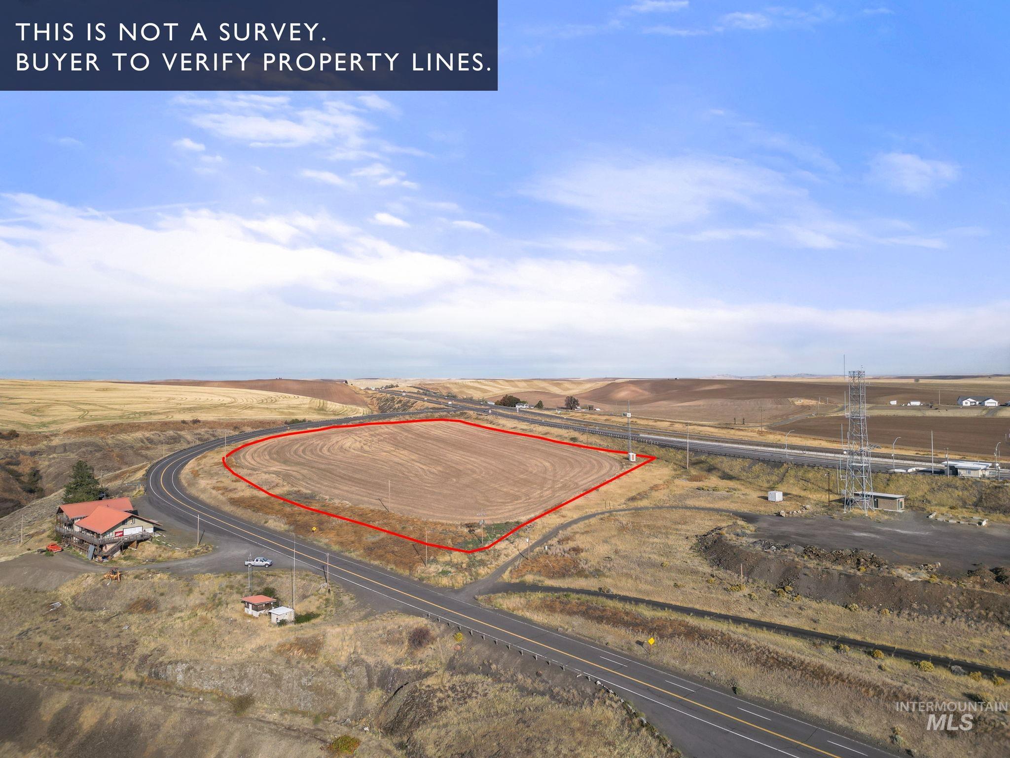 Overview of rural landscape featuring property boundaries highlighted