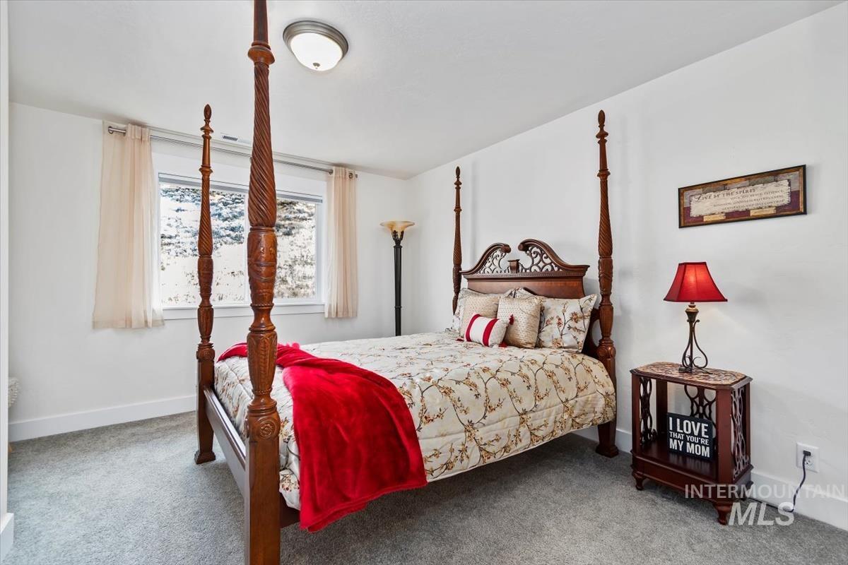 Bedroom featuring carpet