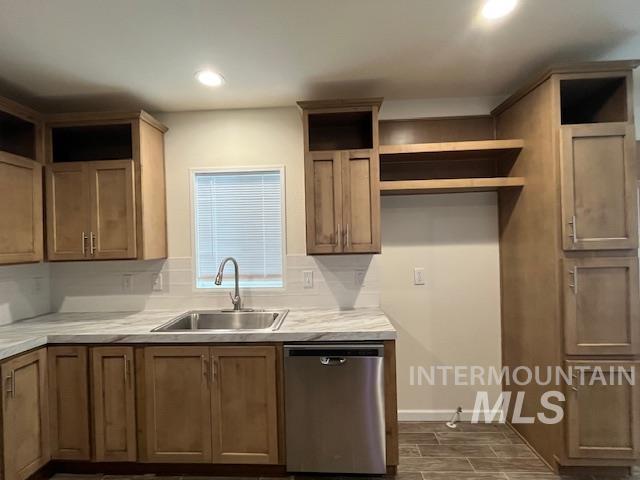 Kitchen with open shelves, stainless steel dishwasher, light countertops, brown cabinetry, and recessed lighting