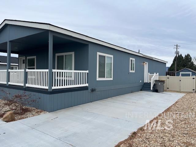 View of home's exterior with a gate