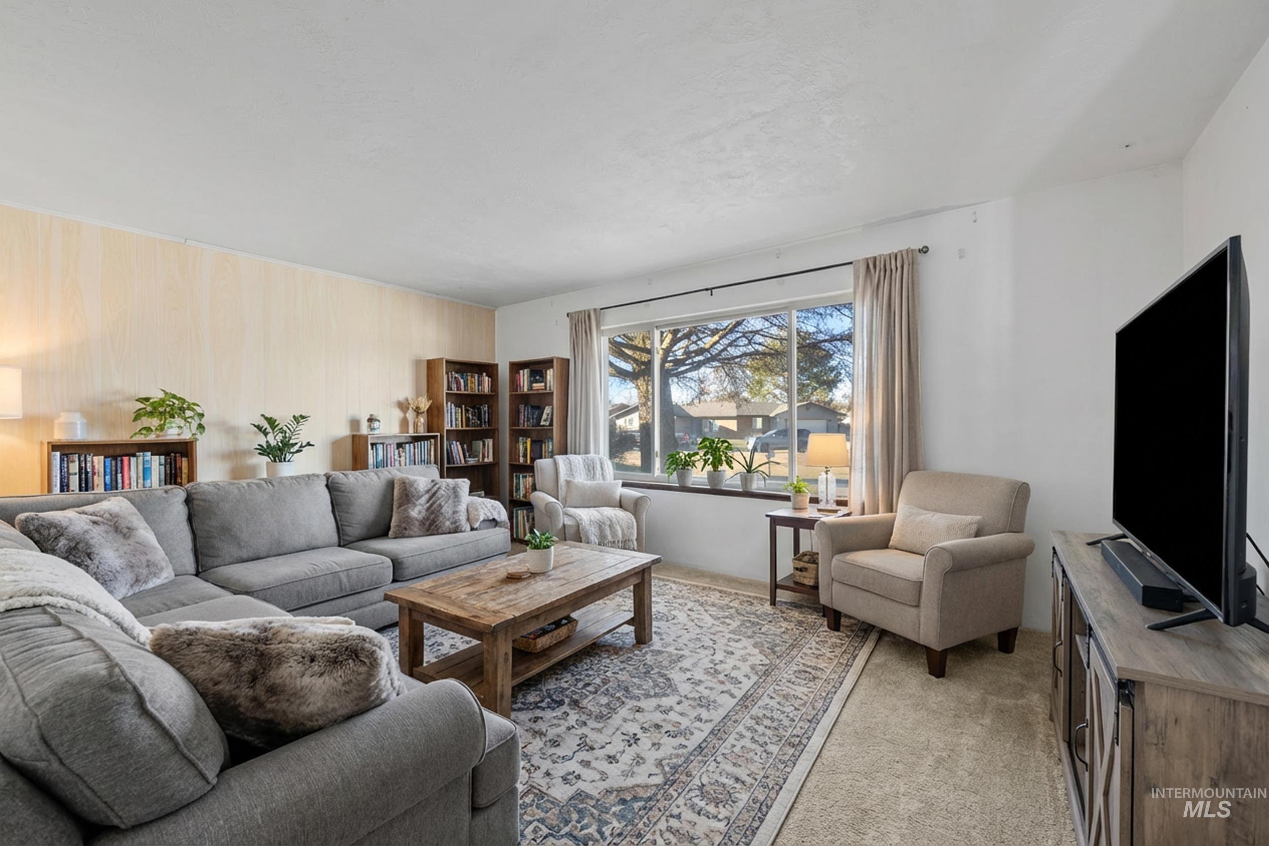 Living room with carpet floors